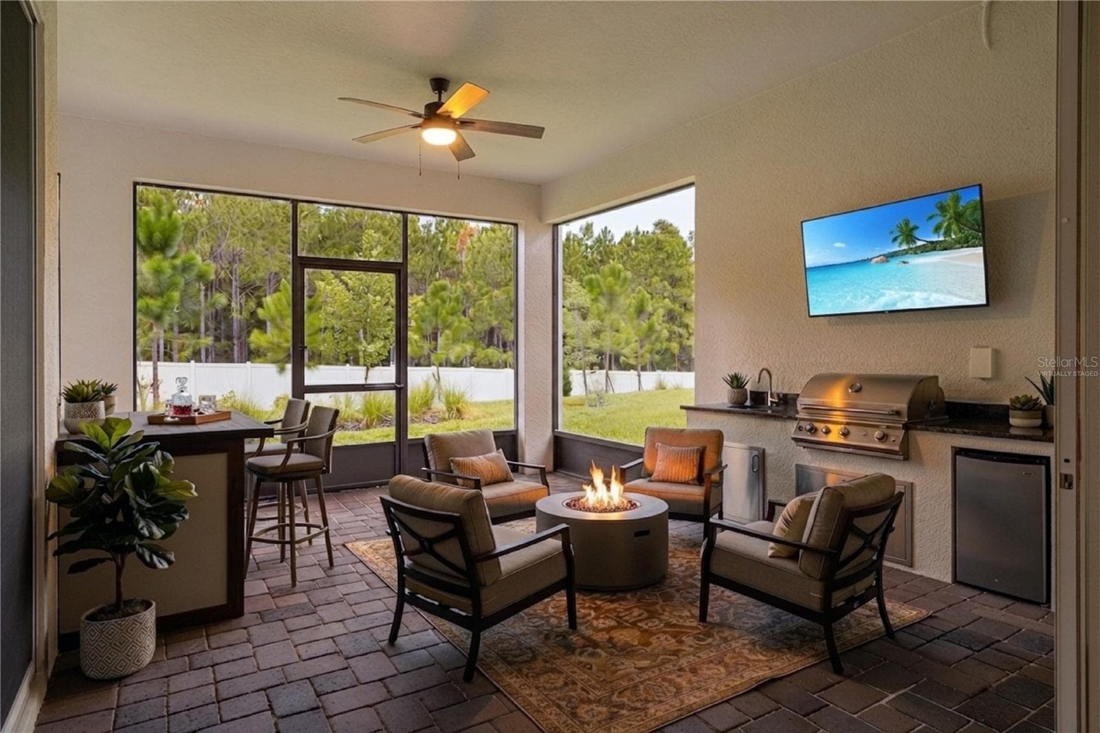 Patio Virtually Staged with ADDED OUTDOOR KITCHEN - 2546 DEL WEBB DR, MINNEOLA
