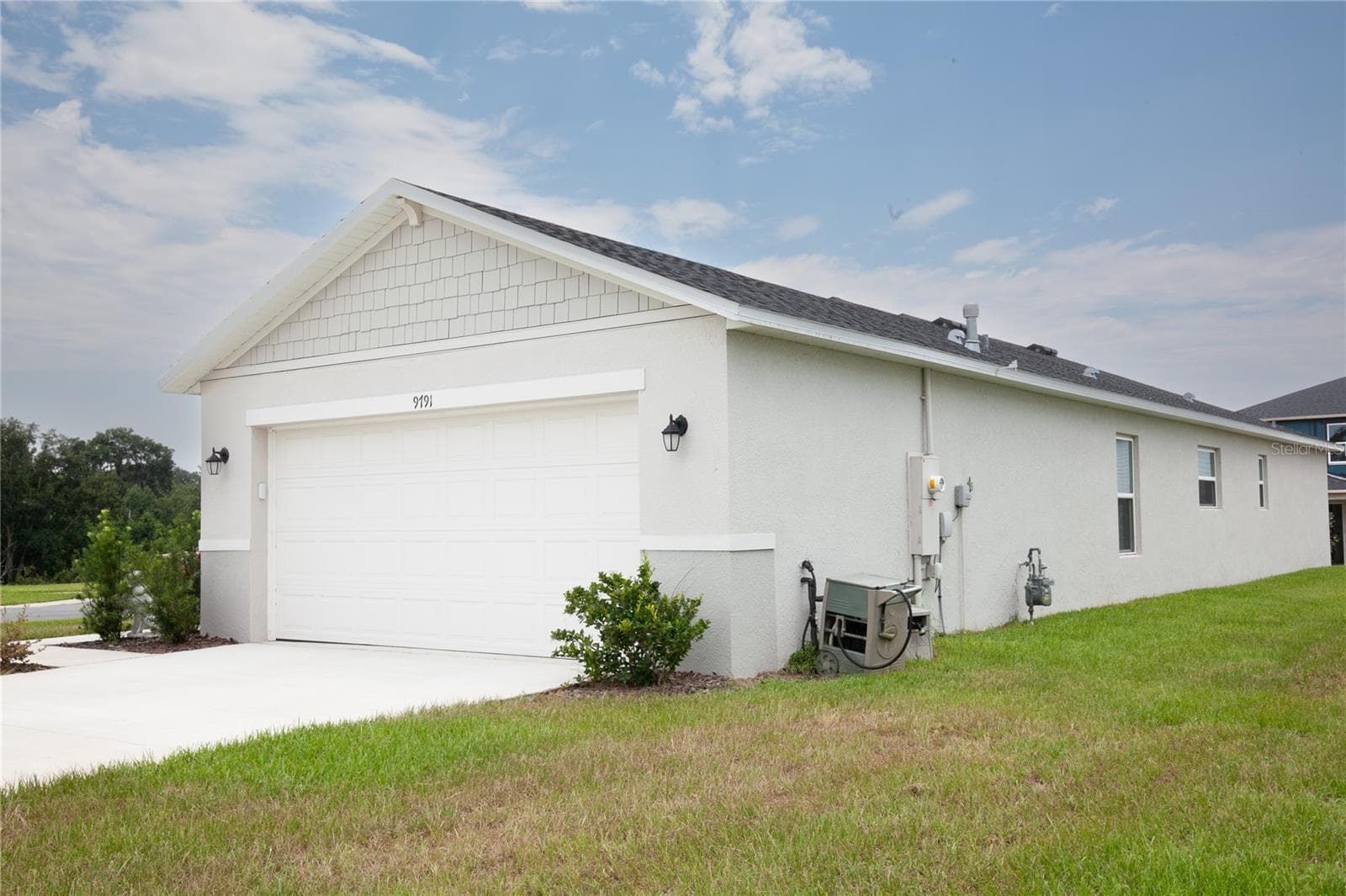FRONT/SIDE OF HOME - 9791 CARSON WAY, LEESBURG