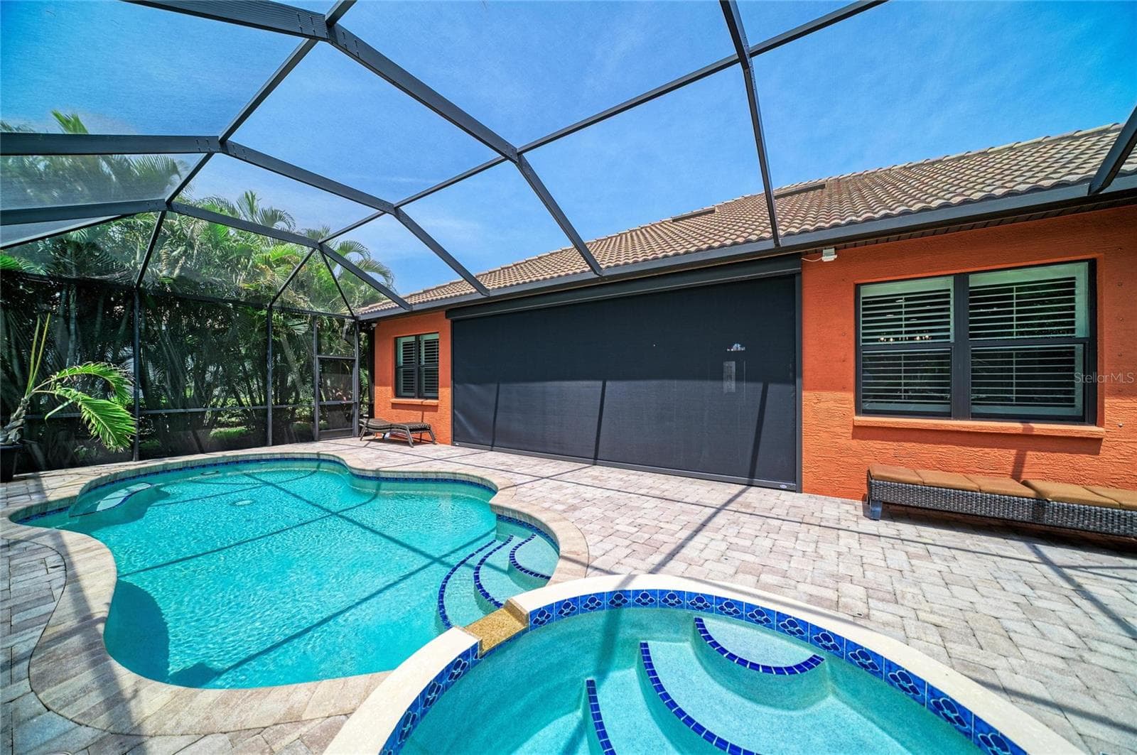 Pool area with Hurricane screen in patio - 545 MAST DR, BRADENTON