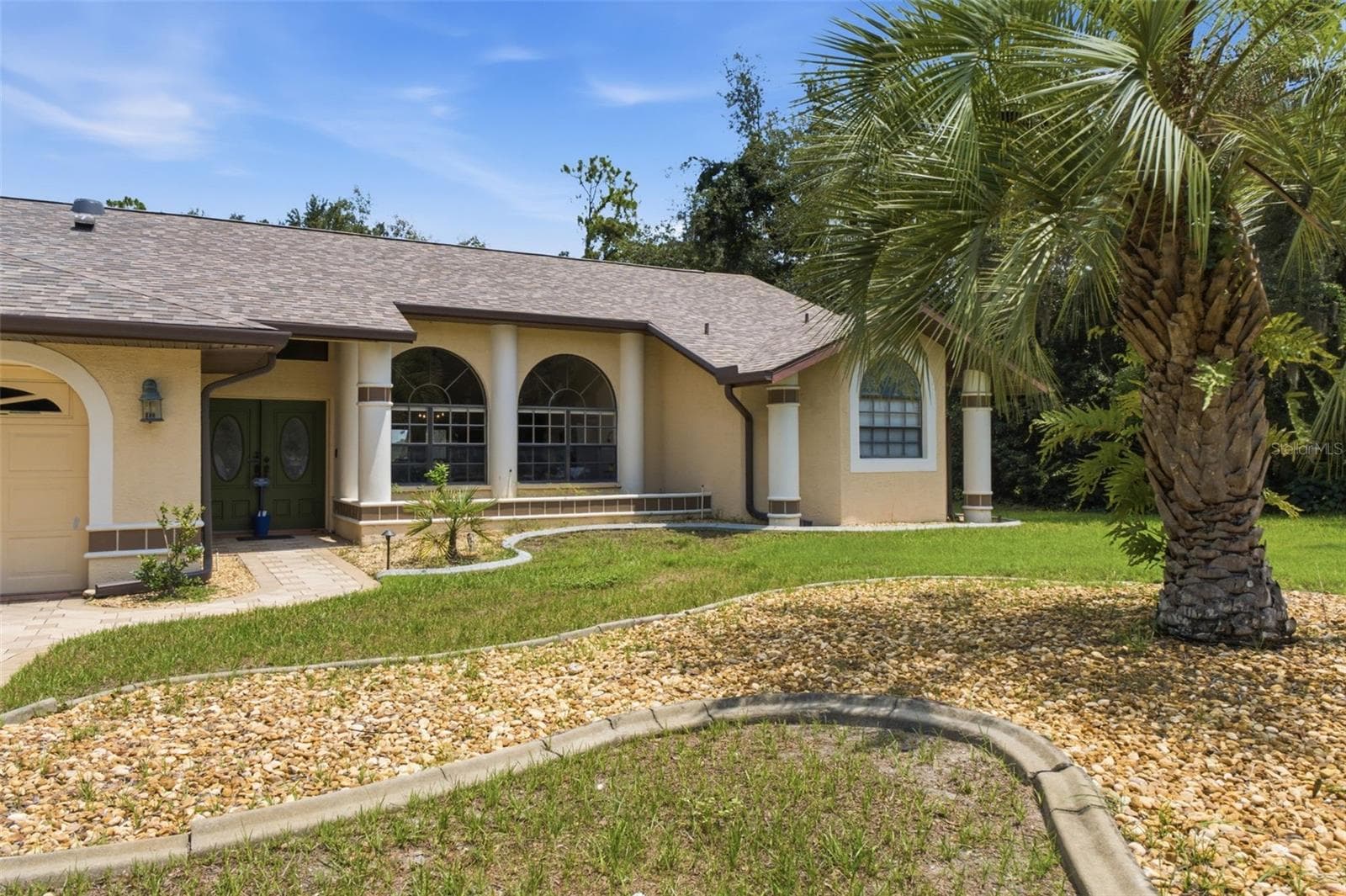 double front door entry - 10307 WATERS EDGE CT, WEEKI WACHEE