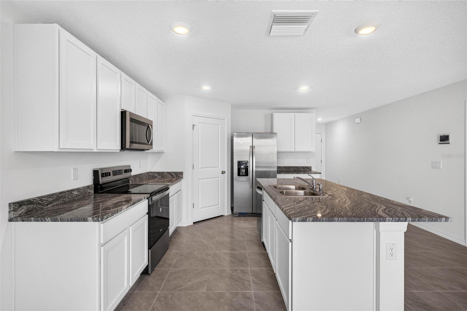 Single Family Residence at 7622 ROSEWOOD GARDEN LOOP, TAMPA, photo 16 of 74