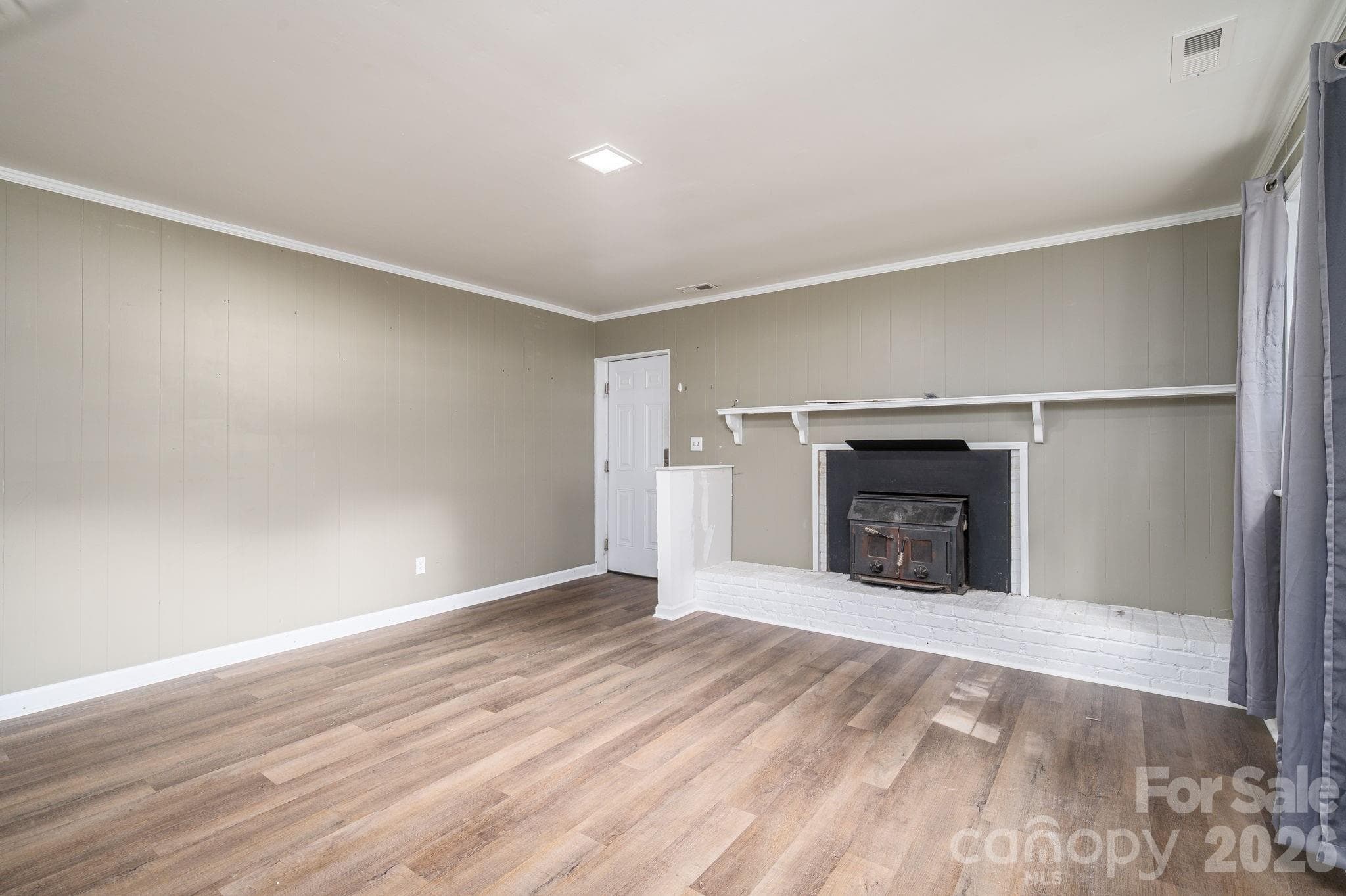 basement den w/ wood burning fireplace - 304 Windsor Drive, Shelby