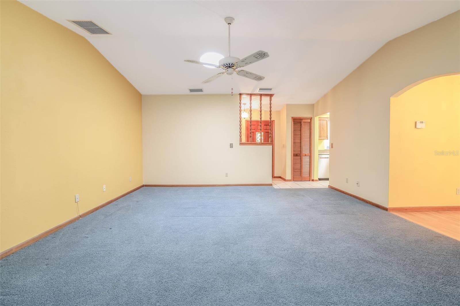 Living Room to Foyer - 229 GEORGETOWNE BLVD, DAYTONA BEACH
