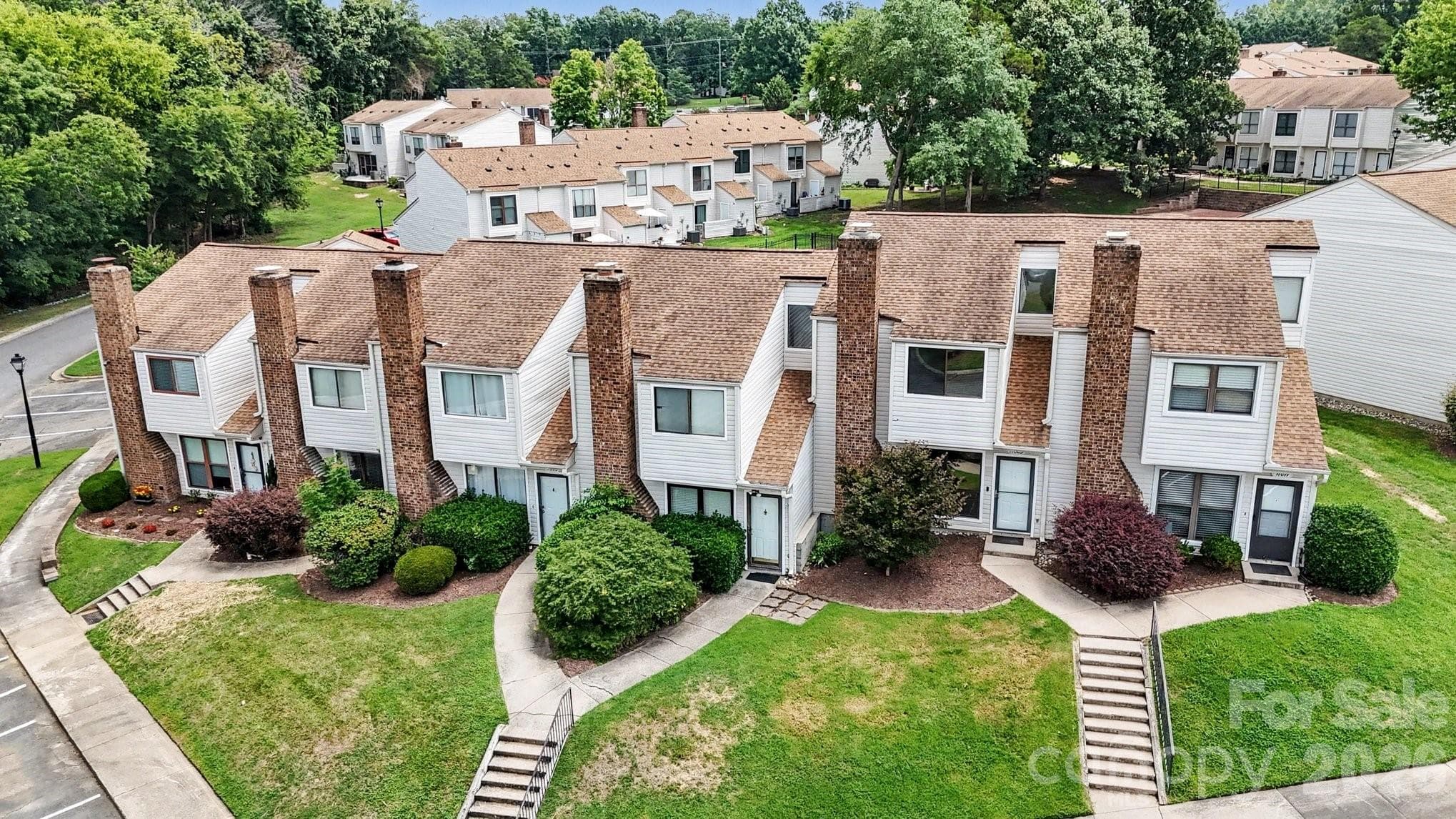 Parking in front of townhouse, numbered assigned space - 11009 Carmel Crossing Road, Charlotte