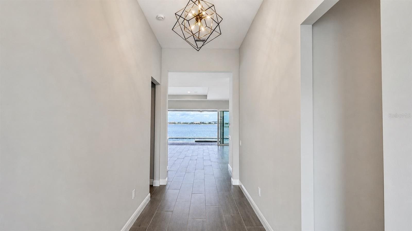 Stunning Lake Views From Front Door Through to Great Room - 812 BLUE SHELL LOOP, SARASOTA