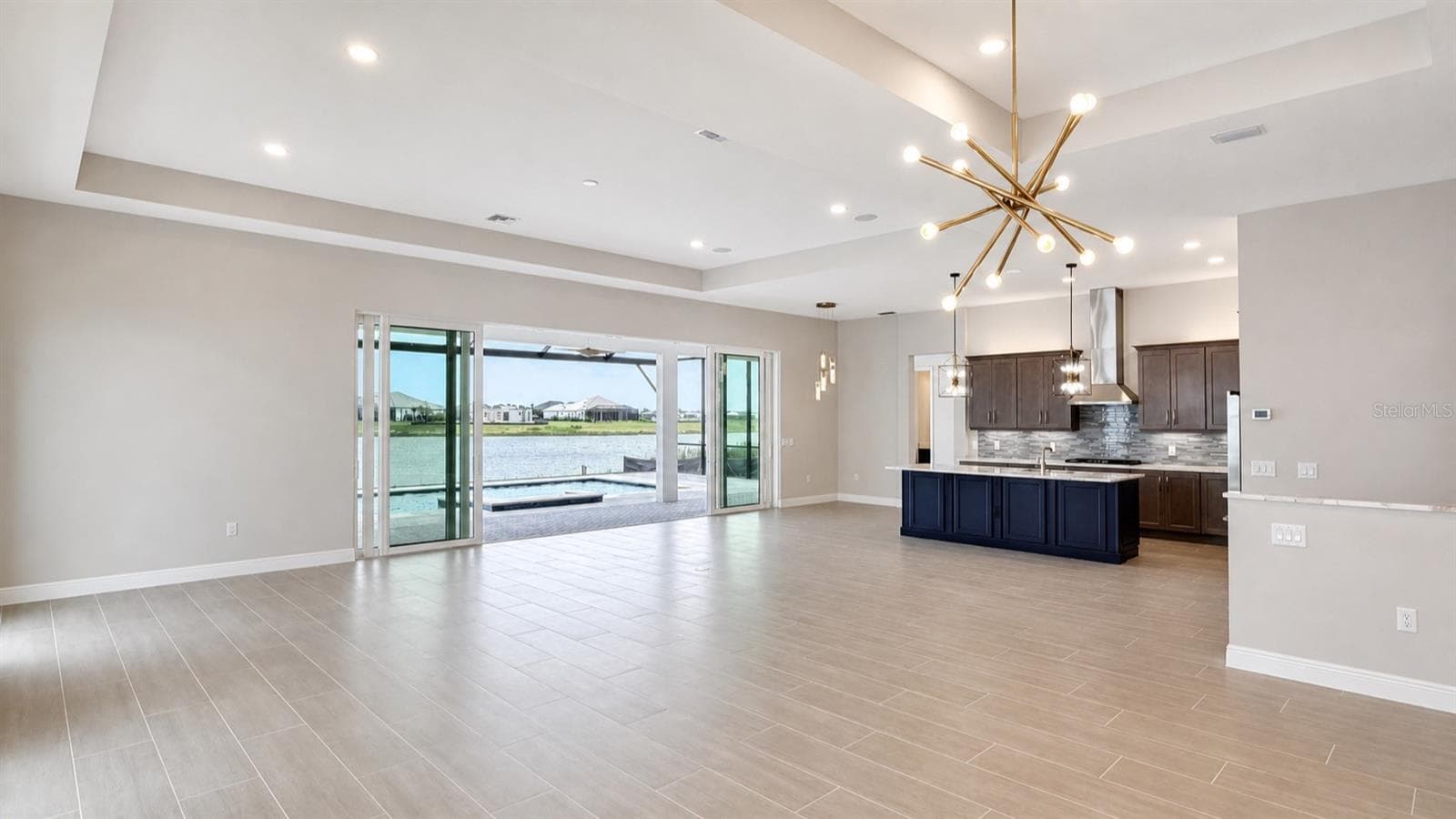 Expanded Great Room and Kitchen - 812 BLUE SHELL LOOP, SARASOTA