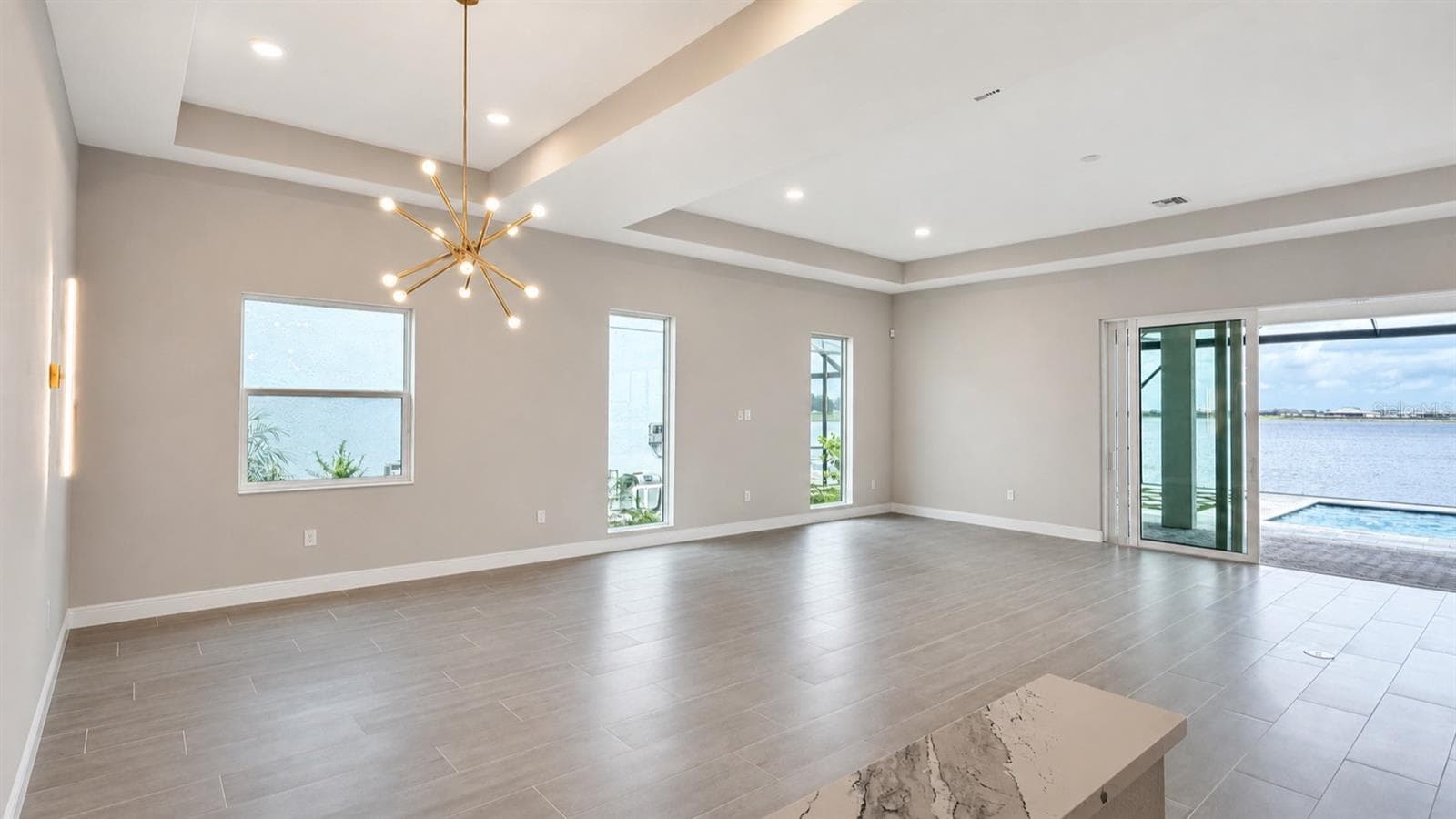 Expanded Great Room and Dining Room - 812 BLUE SHELL LOOP, SARASOTA