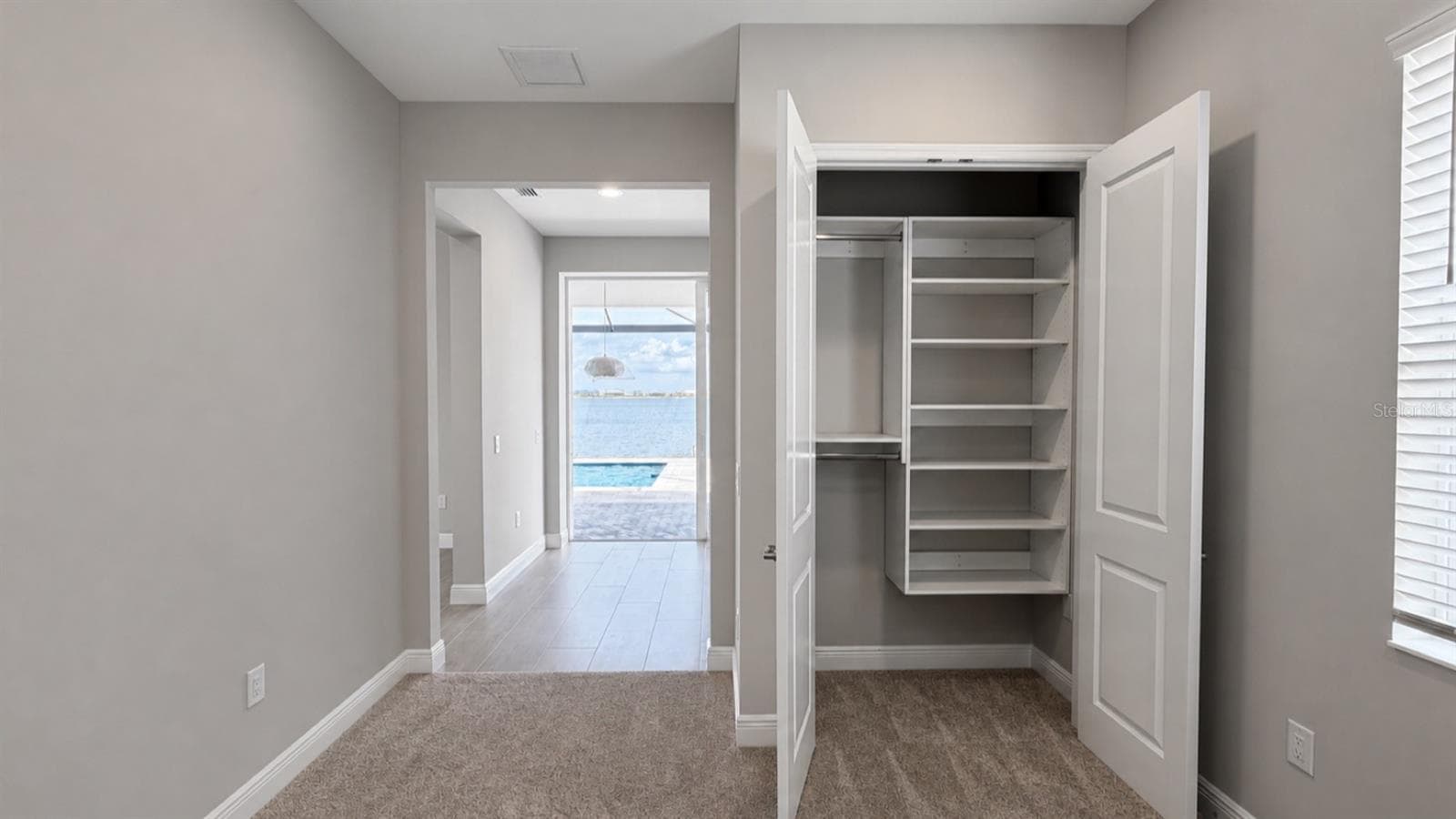 Flex Room View to Lanai & Lake - 812 BLUE SHELL LOOP, SARASOTA