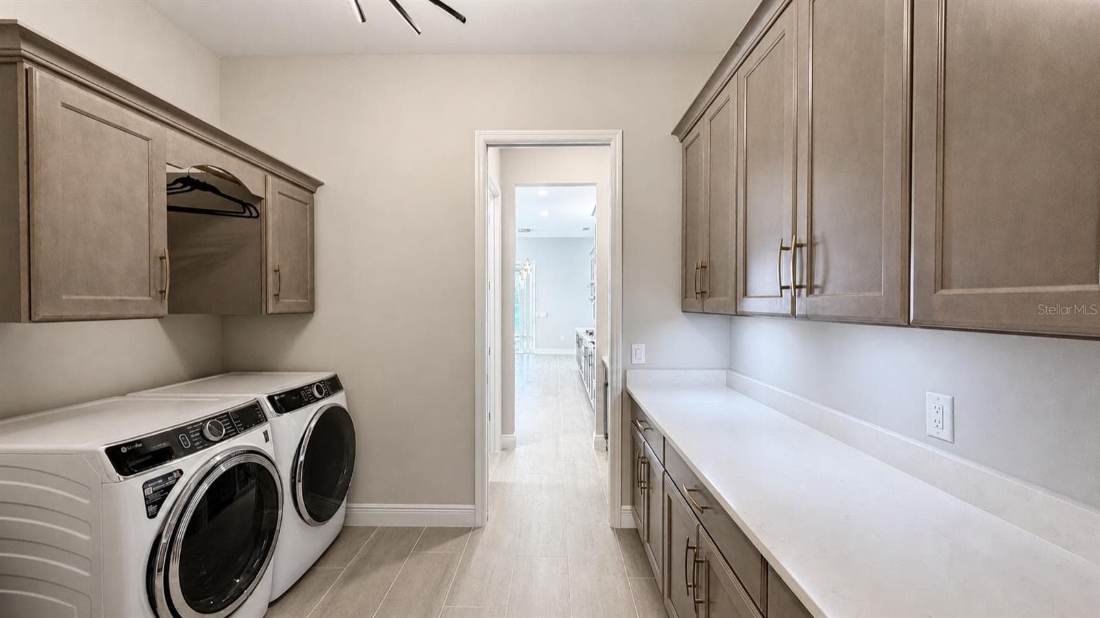Extended Custom Cabinets in Laundry Room - 812 BLUE SHELL LOOP, SARASOTA