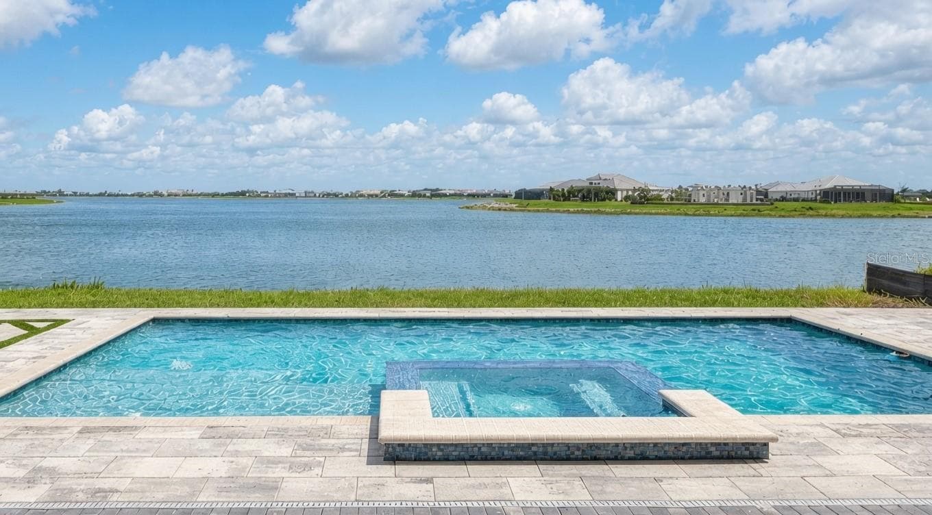 Unobstructed “Forever” View of Lake Merganser - 812 BLUE SHELL LOOP, SARASOTA