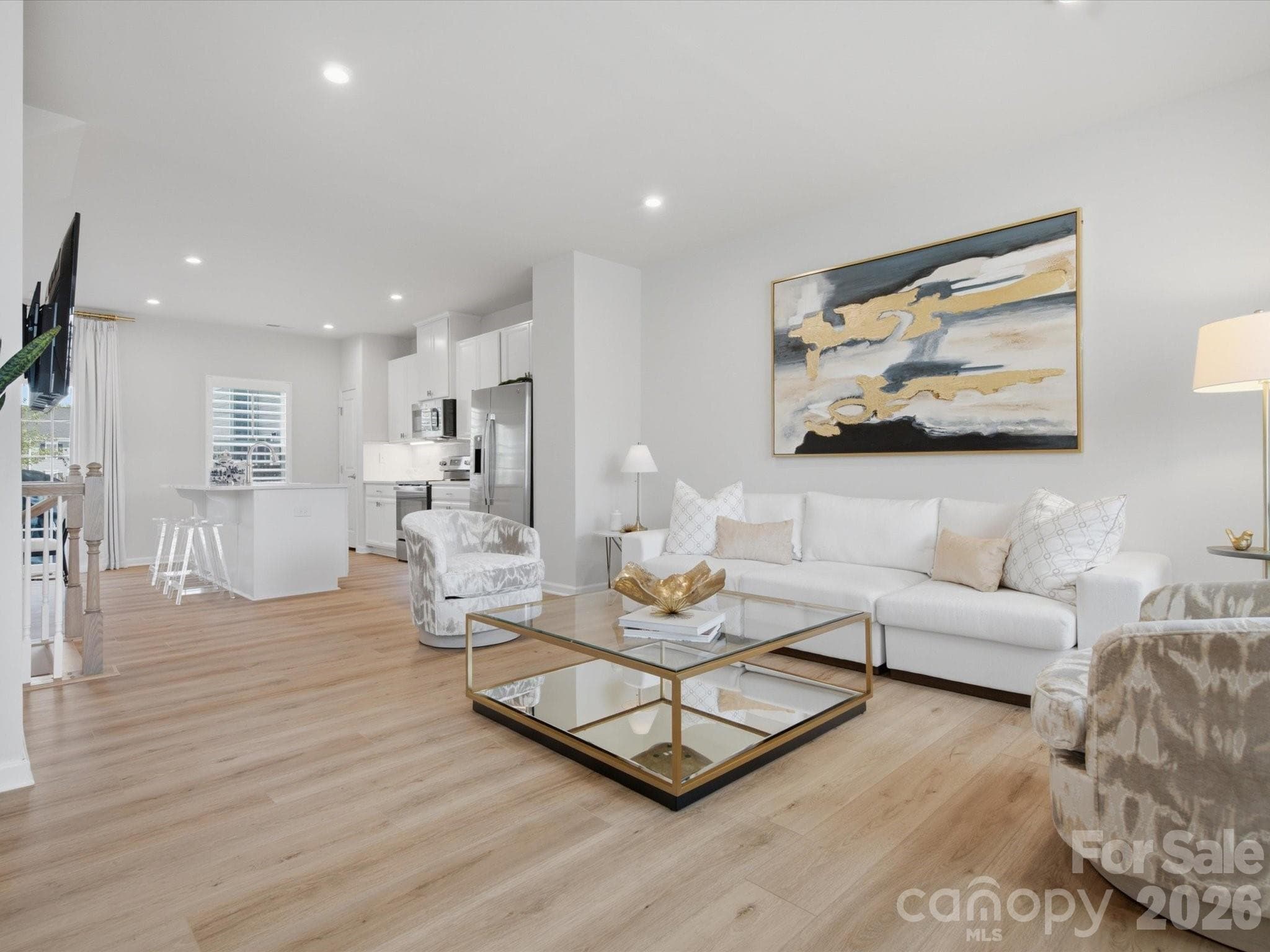 Main living room with open floor plan and lots of natural light. - 4014 Edenborn Lane, Charlotte
