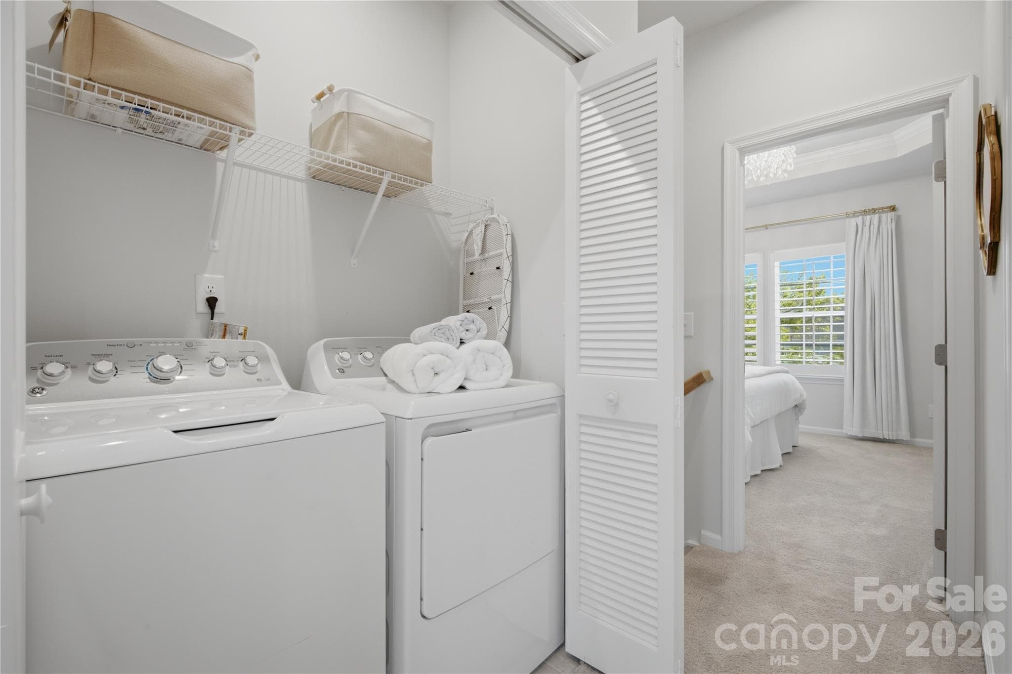Laundry near the bedrooms. - 4014 Edenborn Lane, Charlotte