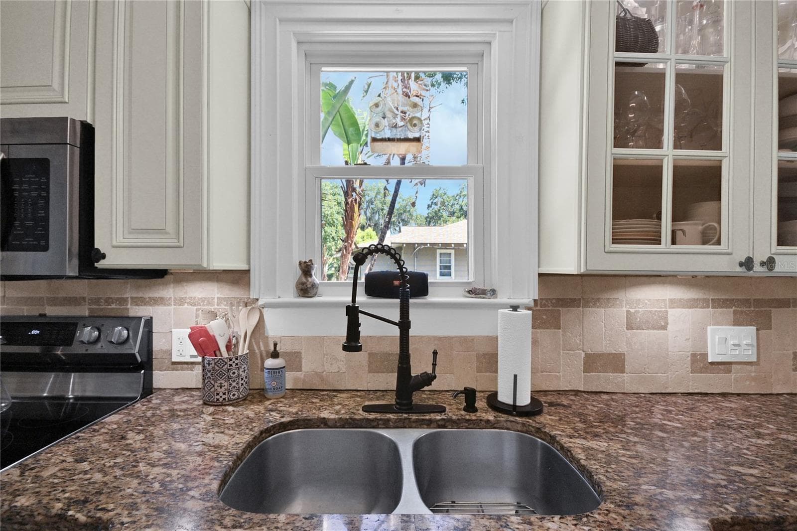 Kitchen sink with a window. - 1112 PALMETTO ST, NEW SMYRNA BEACH