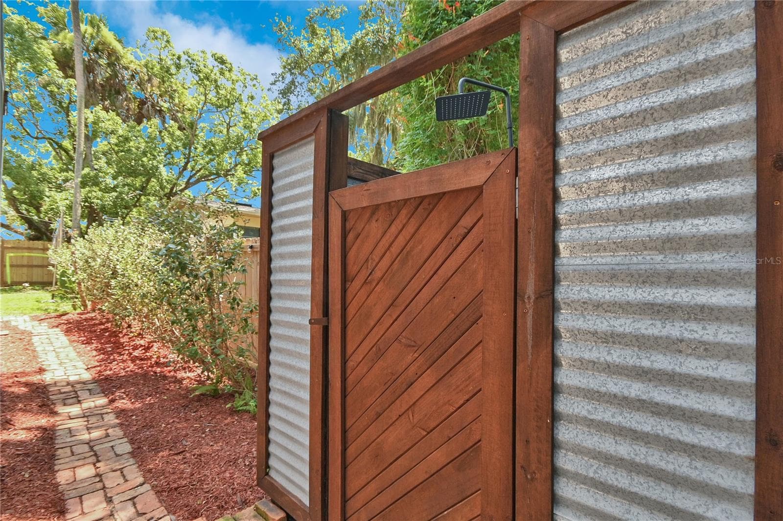 Outdoor shower. - 1112 PALMETTO ST, NEW SMYRNA BEACH
