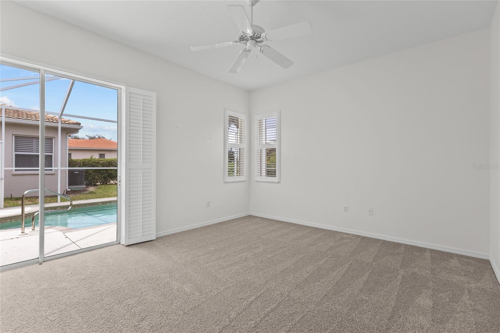 All 3 bedrooms have Brand New Carpet. Master #1 has sliders to Lanai and Pool, Walk-in Closet, en suite Bath with shower with separate tub - 125 RIO TERRA, VENICE