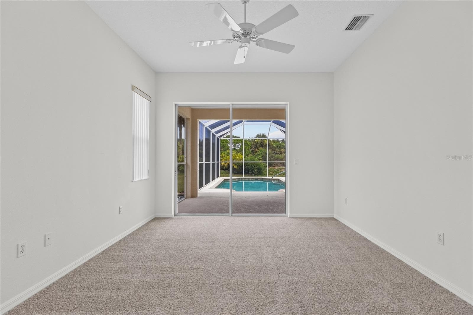 Master #2 with sliders out to Lanai and Pool. - 125 RIO TERRA, VENICE
