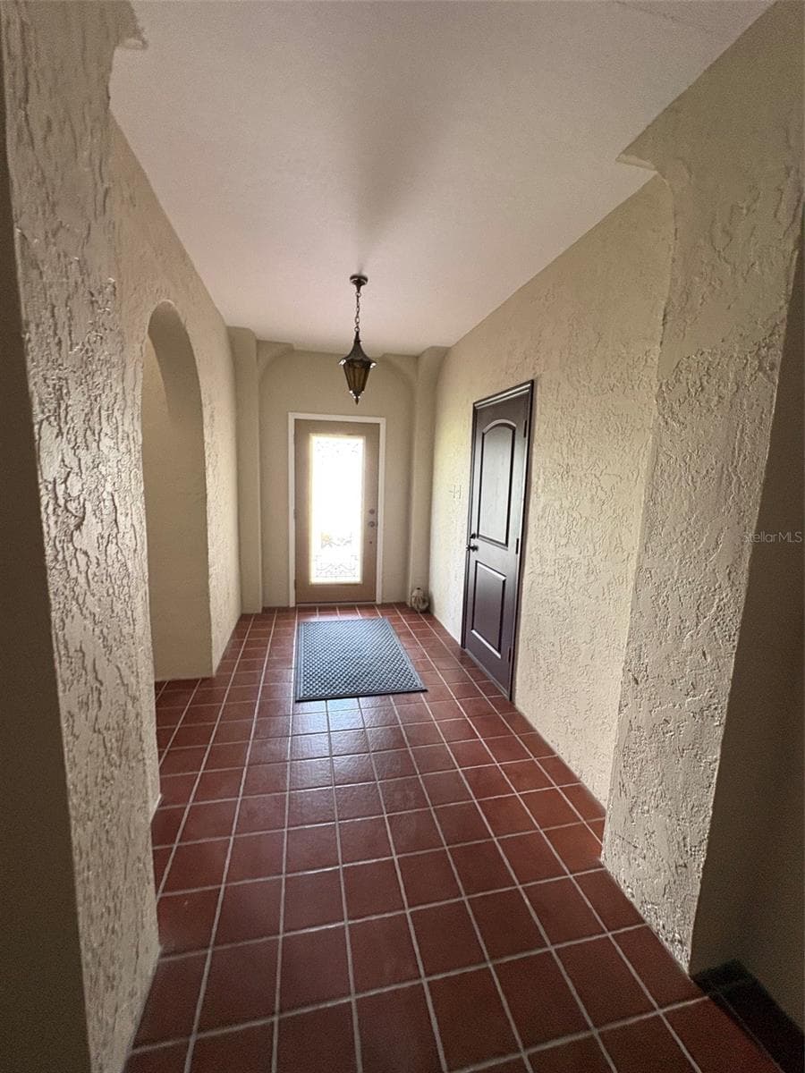 Hallway Entrance looking to Front Door - 15810 REDINGTON DR, REDINGTON BEACH