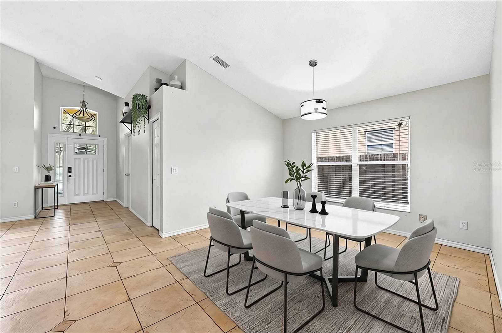 Foyer opens up to versatile formal living and dining spaces. Virtually Staged. - 2551 WALNUT HEIGHTS RD, APOPKA