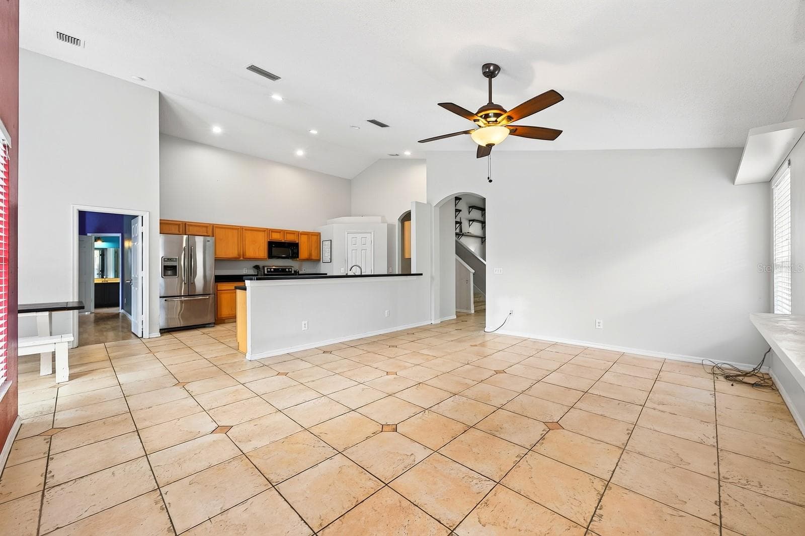 Family room is open to the kitchen. - 2551 WALNUT HEIGHTS RD, APOPKA