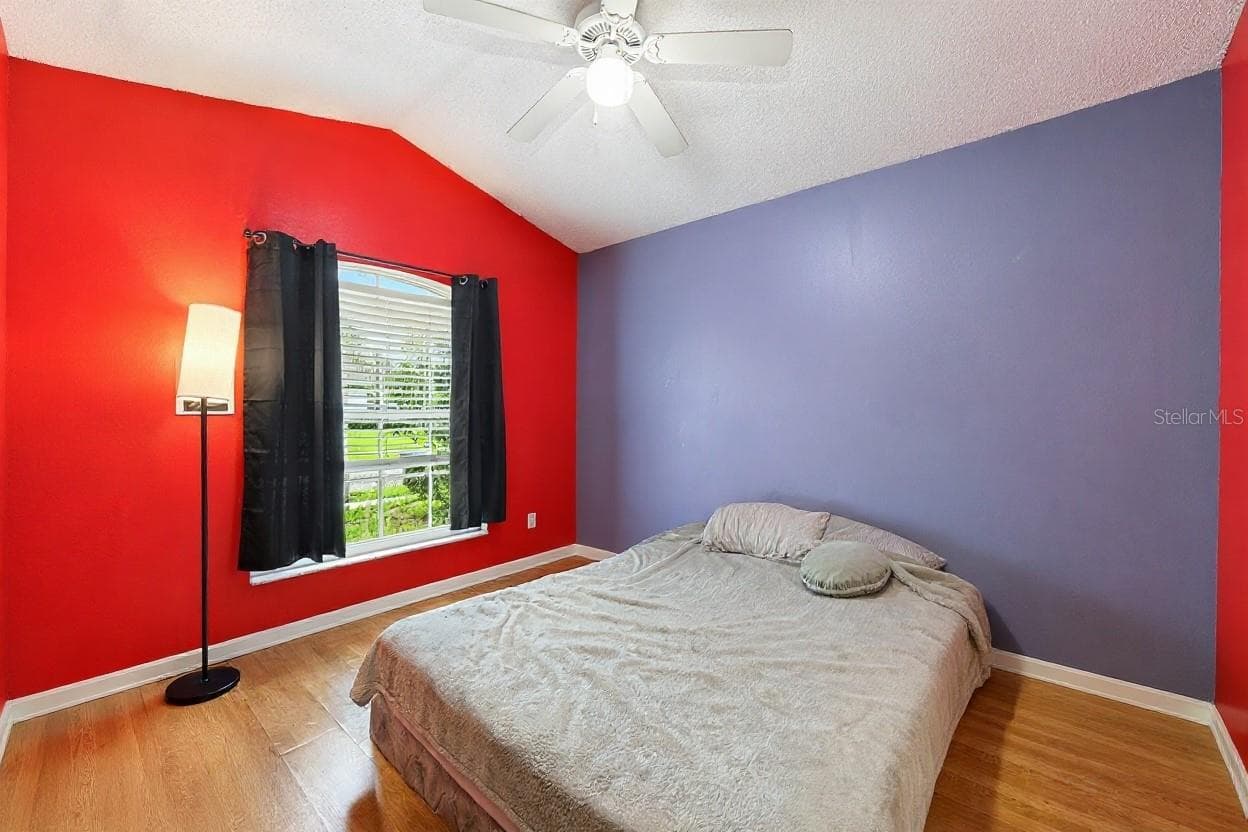 Guest bedroom suite. Personal items have been removed virtually. - 2551 WALNUT HEIGHTS RD, APOPKA
