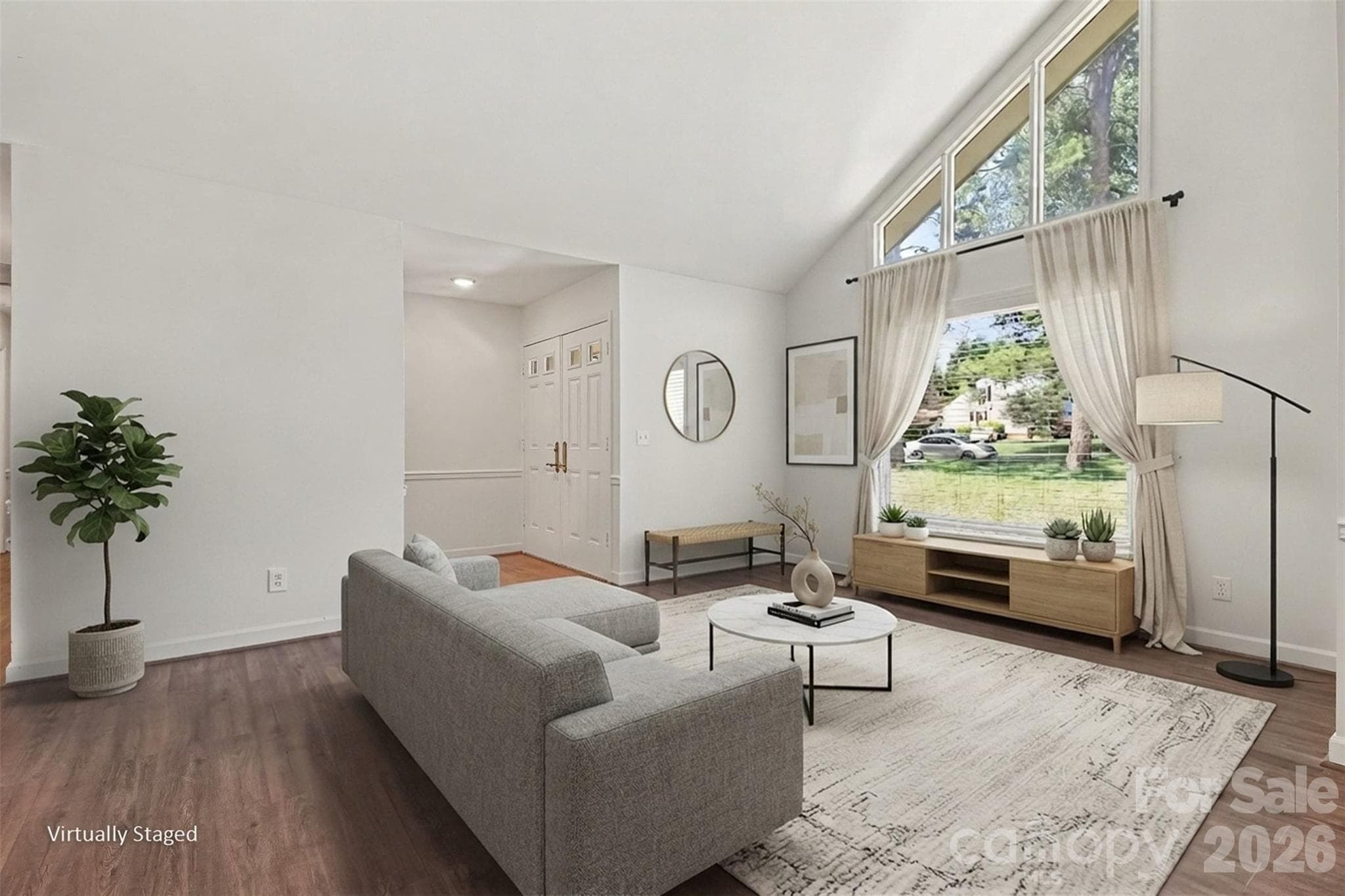And there is great natural light in the home, especially in the vaulted living room. - 13520 Andulusian Drive, Matthews
