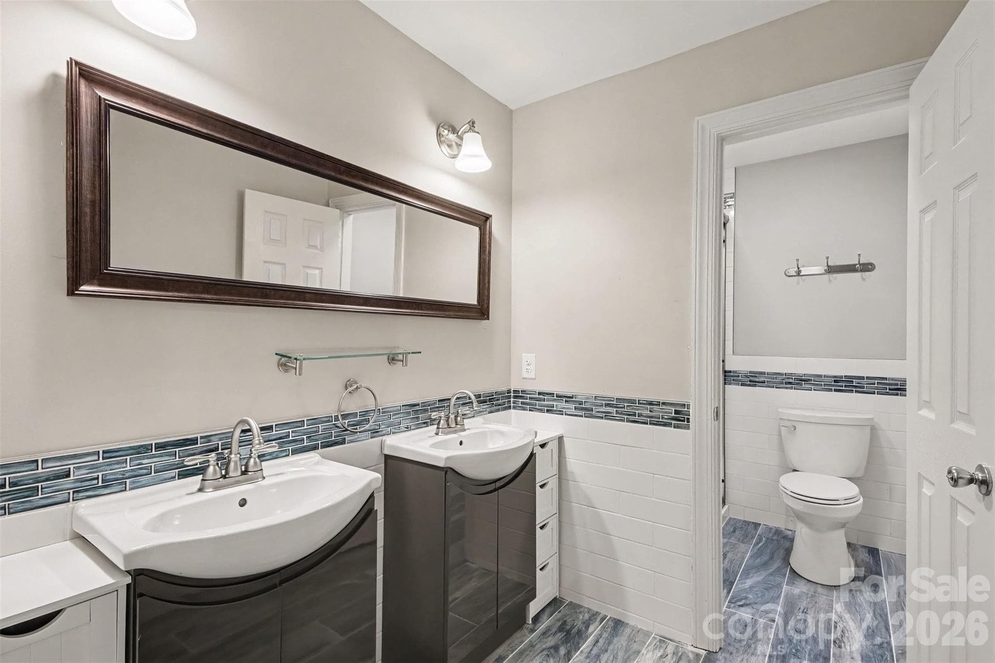Bathroom 2 also has dual vanities and has been beautifully updated. - 13520 Andulusian Drive, Matthews