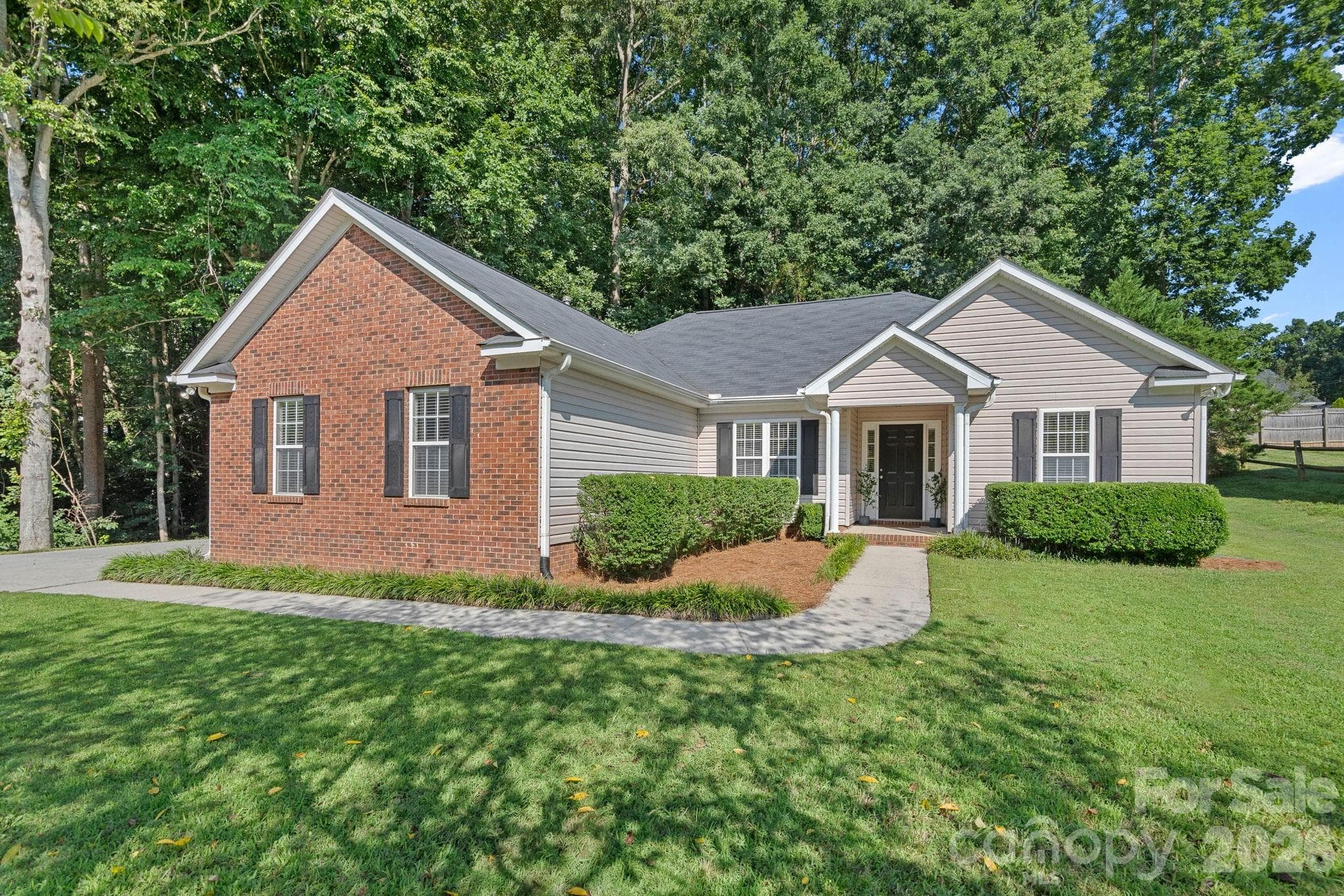 Single Family Residence at 7219 Oxford Hunt Drive, Stanley, photo 2 of 26