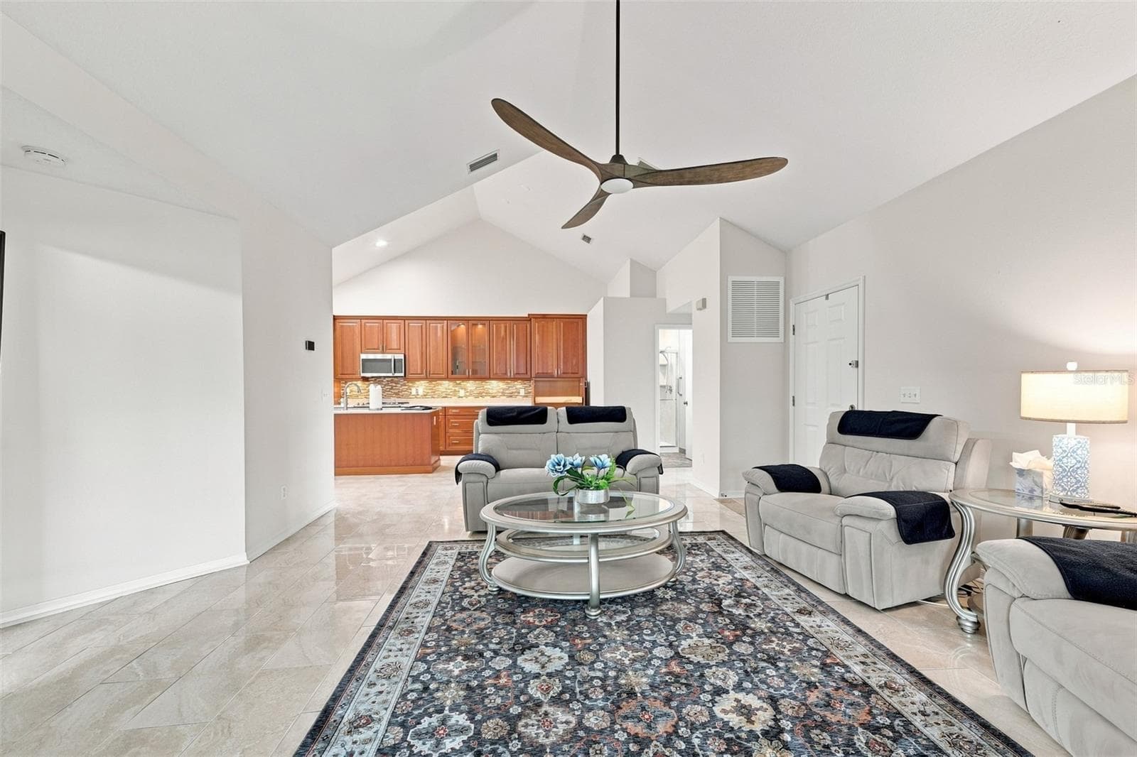 High cathedral ceilings and modern finishes and paint tones accentuate the entire home. - 1124 GOLFVIEW WOODS DR #na, SUN CITY CENTER