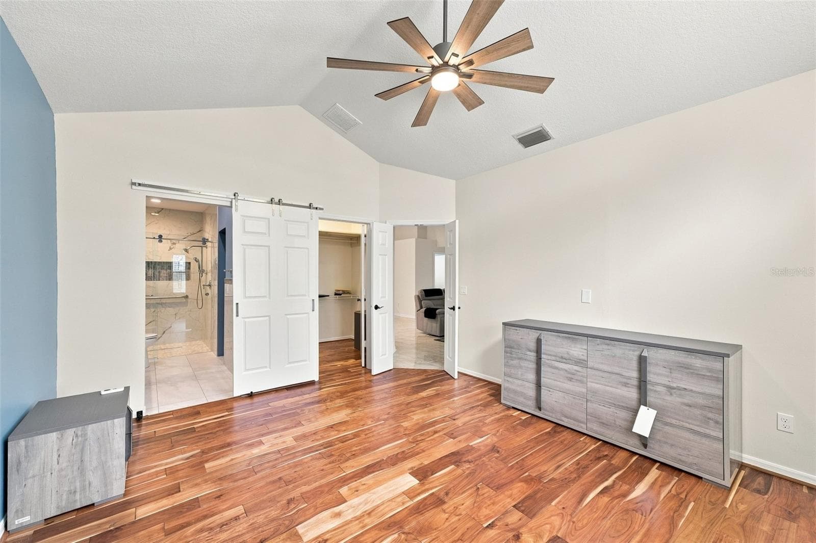 Primary Bedroom is spacious with a walk in closet and ensuite bath. - 1124 GOLFVIEW WOODS DR #na, SUN CITY CENTER