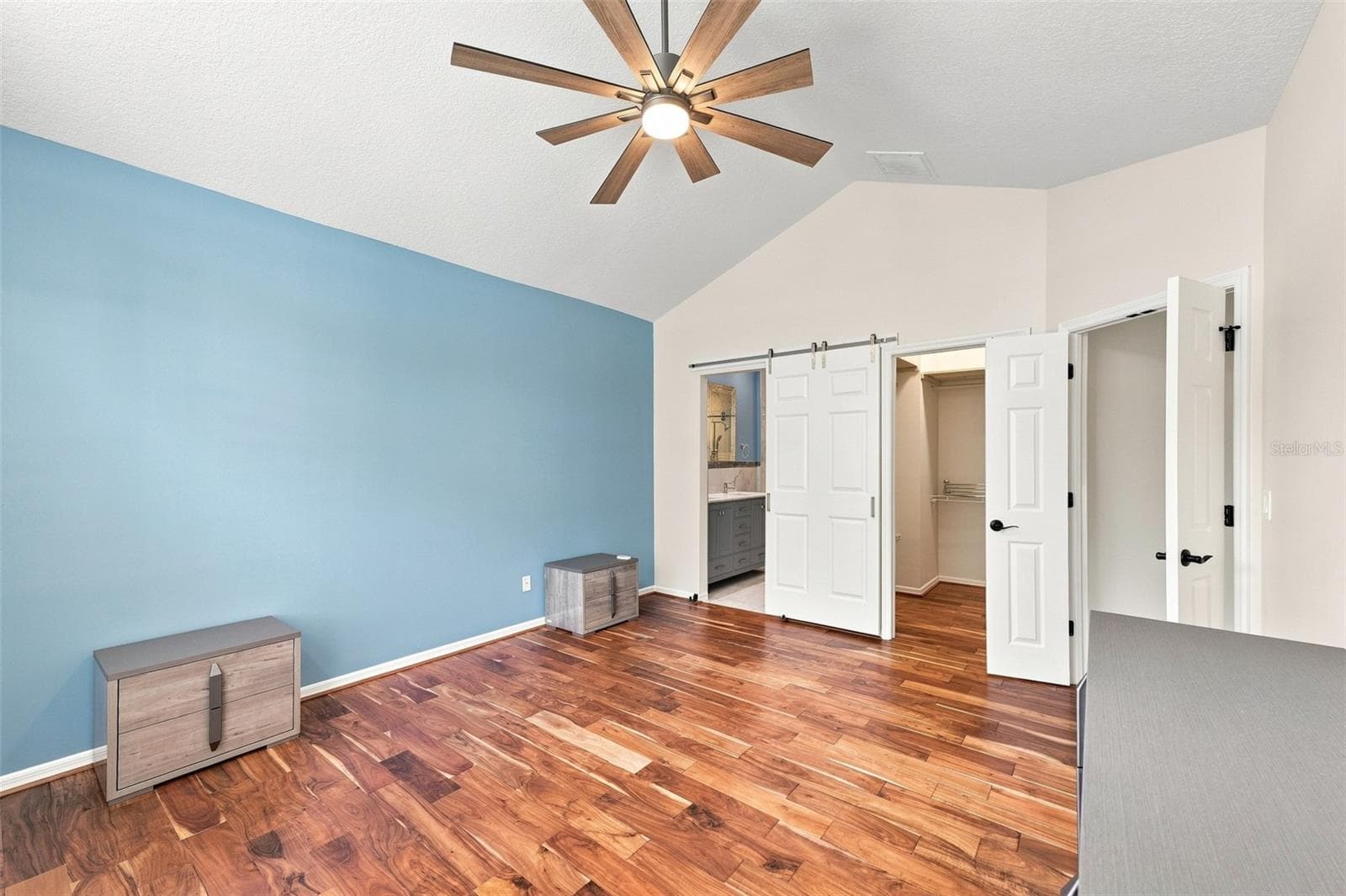 Stunning laminate floors compliment the beautiful coastal vibe that is present in the home. - 1124 GOLFVIEW WOODS DR #na, SUN CITY CENTER