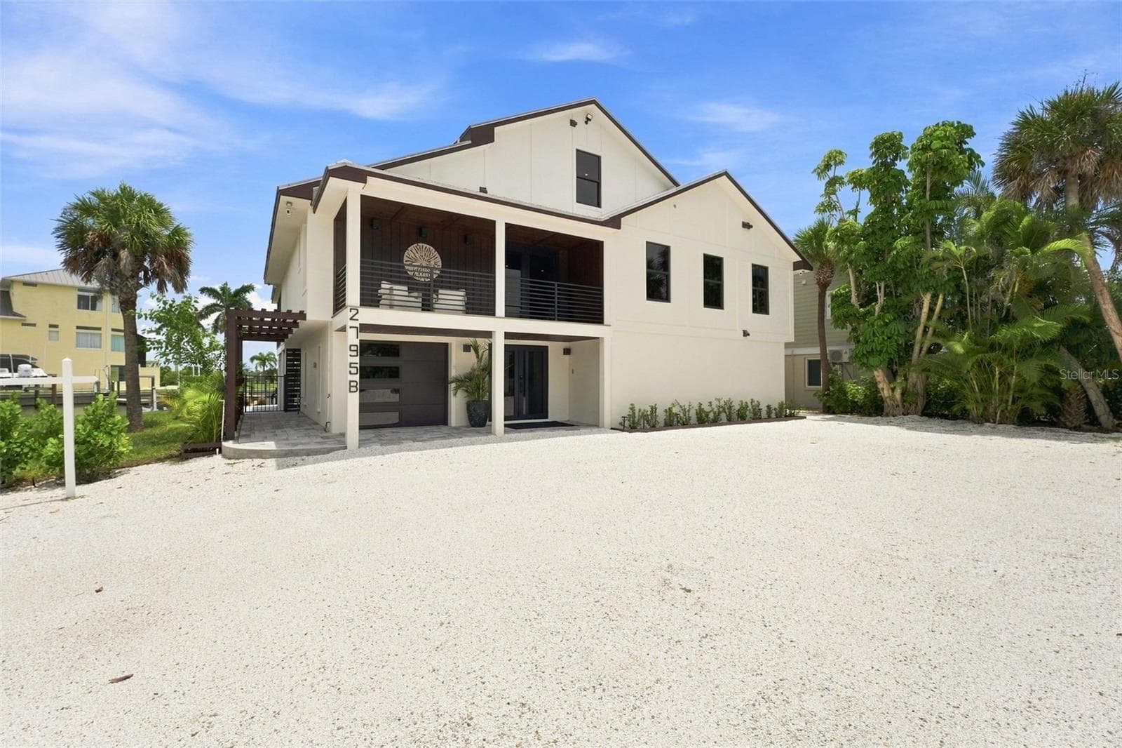 front with new 10x28 under building garage - 2795 N BEACH RD #B, ENGLEWOOD