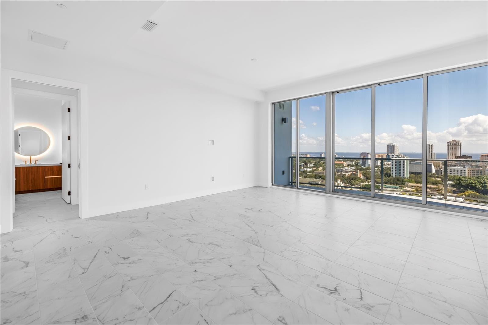 Across the great room is the second bedroom and bath that could almost be considered another primary suite. - 777 3RD AVE N #1704, ST PETERSBURG