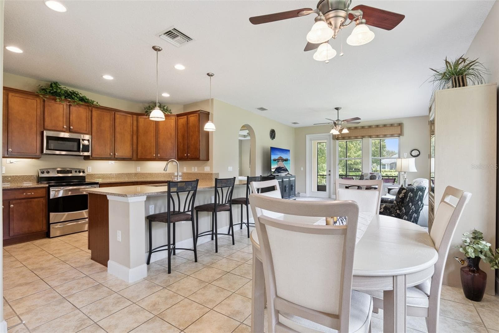 View of the Dining & Kitchen areas w/ a breakfast bar - 1381 ABBOT WAY, DELAND