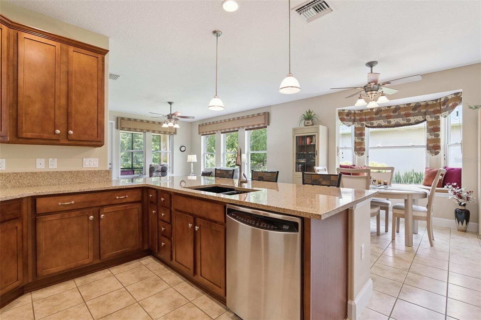 Looking from the Kitchen towards the Dining & Great Room areas - 1381 ABBOT WAY, DELAND