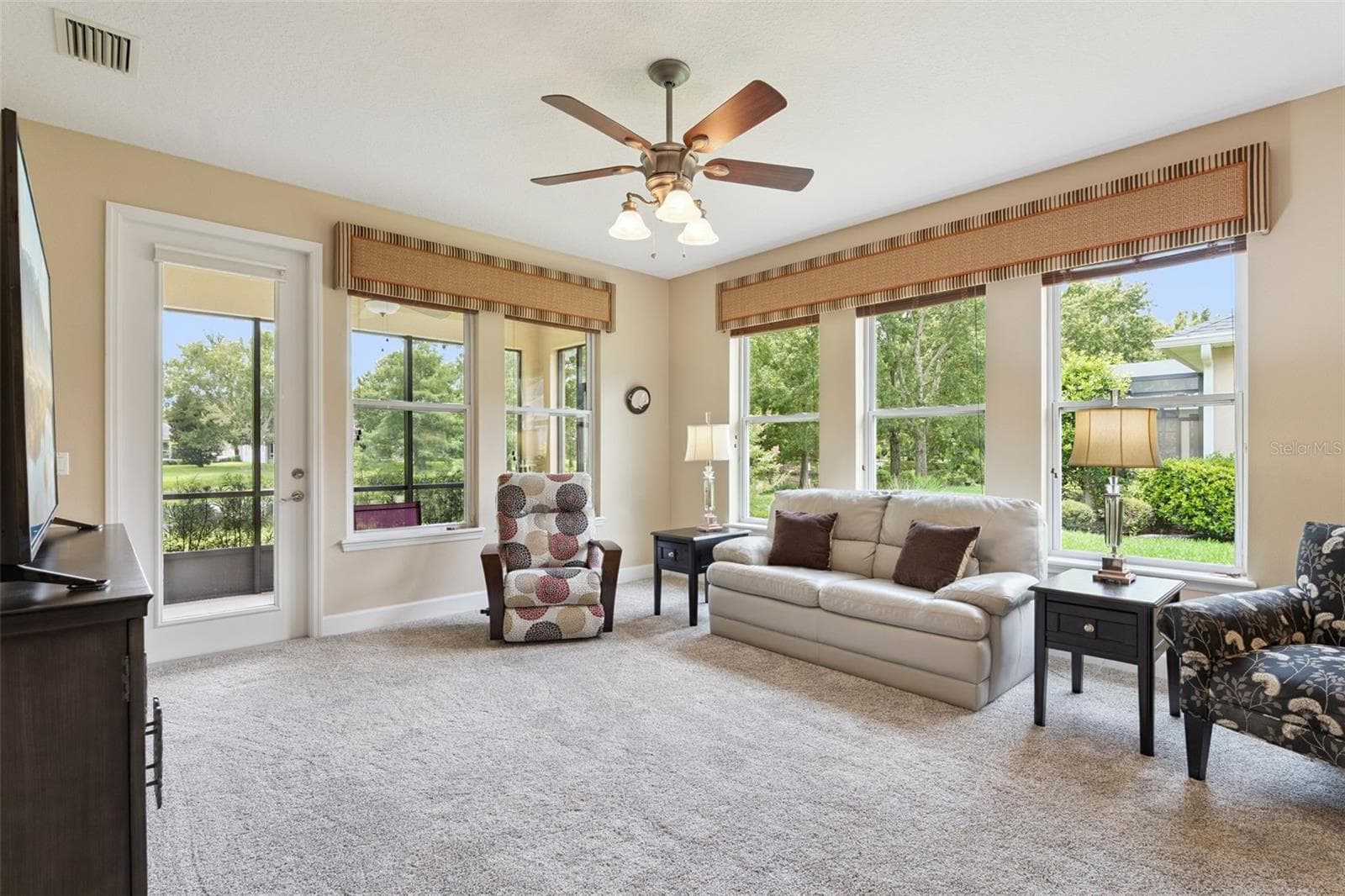 Great Room w/ a French door that leads out to the screen enclosed covered lanai - 1381 ABBOT WAY, DELAND
