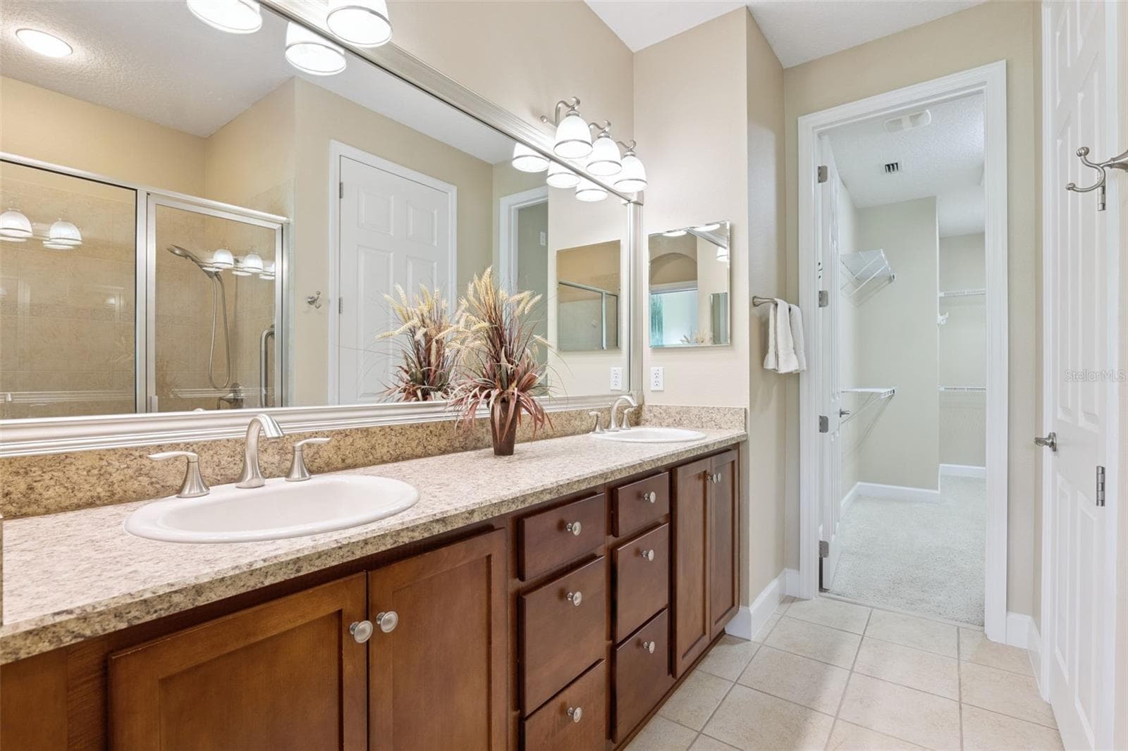 Primary Bathroom vanity w/ framed mirror & dual sinks - 1381 ABBOT WAY, DELAND