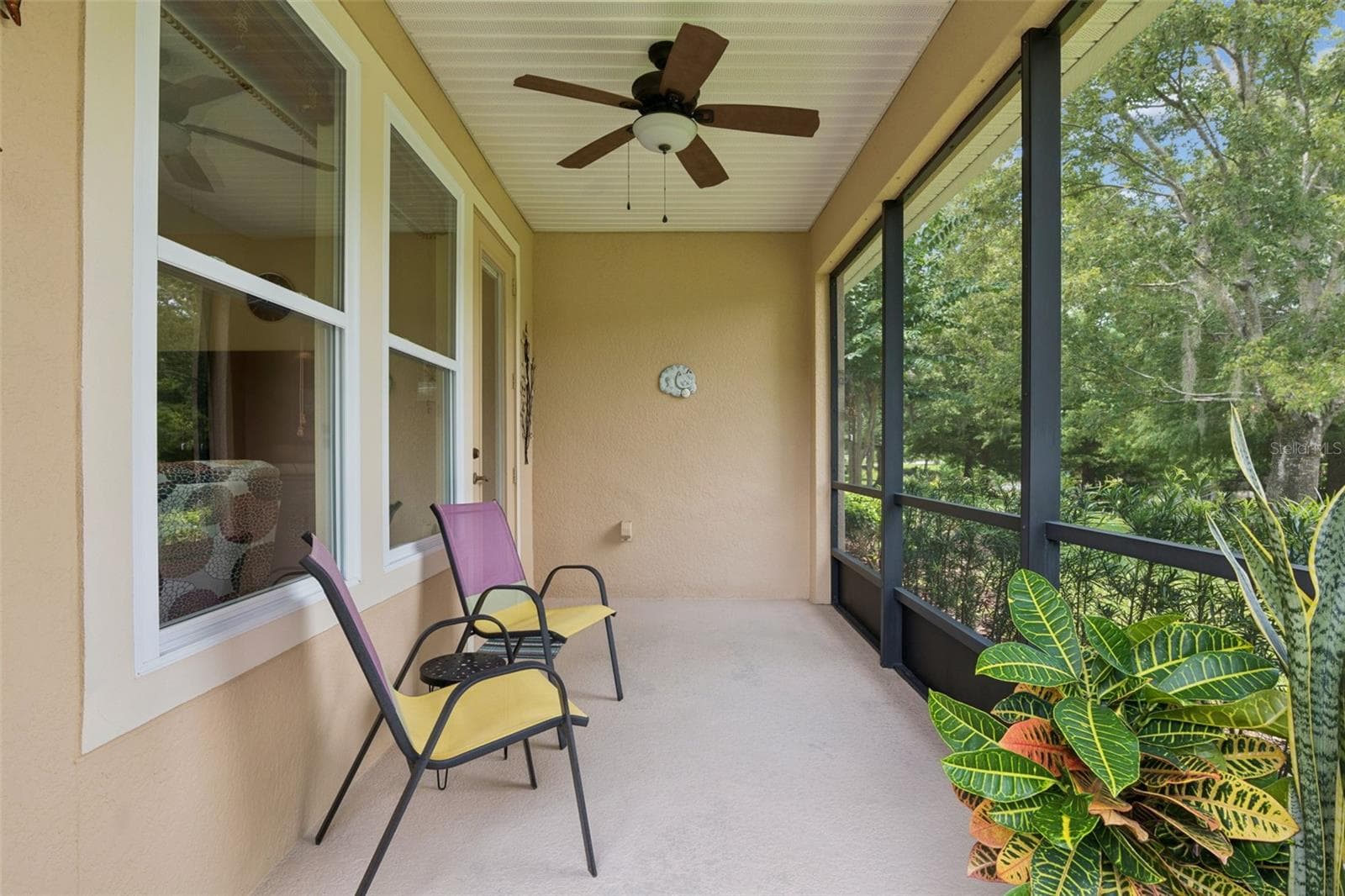 Screen enclosed covered Lanai w/ a ceiling fan - 1381 ABBOT WAY, DELAND