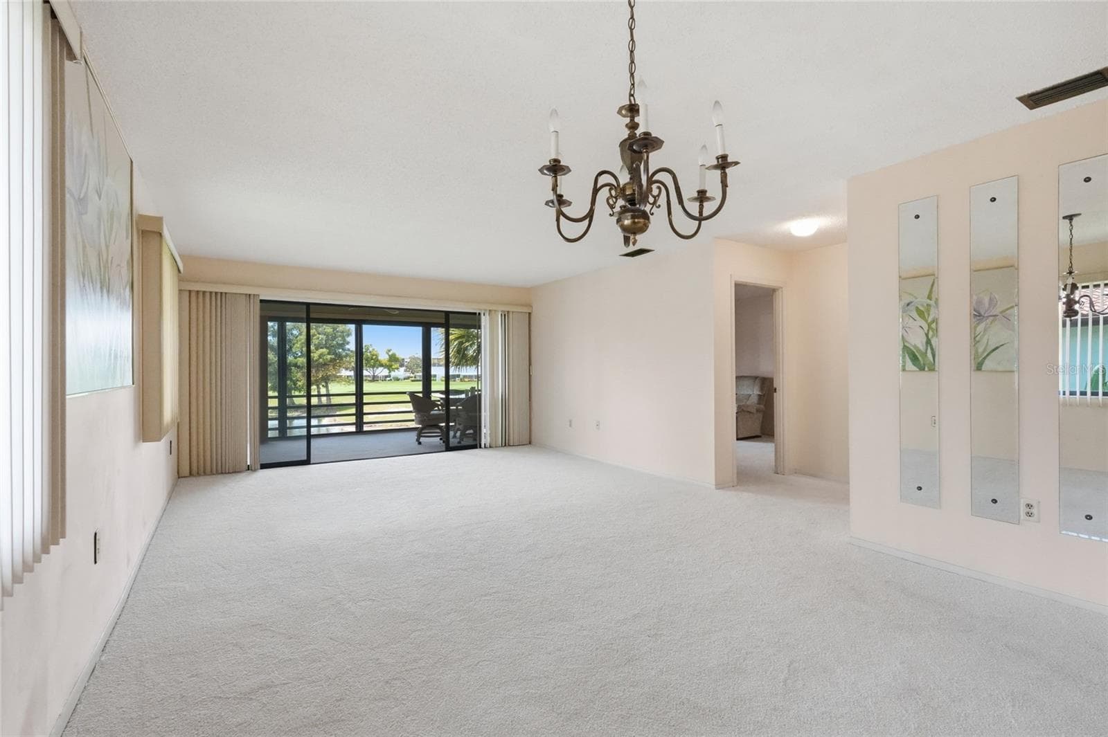 dining room/living room - 3500 EL CONQUISTADOR PKWY #332, BRADENTON