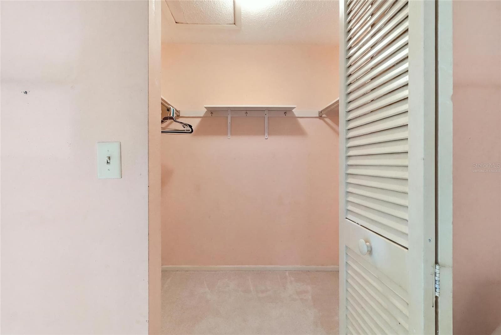 Virtually staged walk in closet bedroom 2 - 3500 EL CONQUISTADOR PKWY #332, BRADENTON