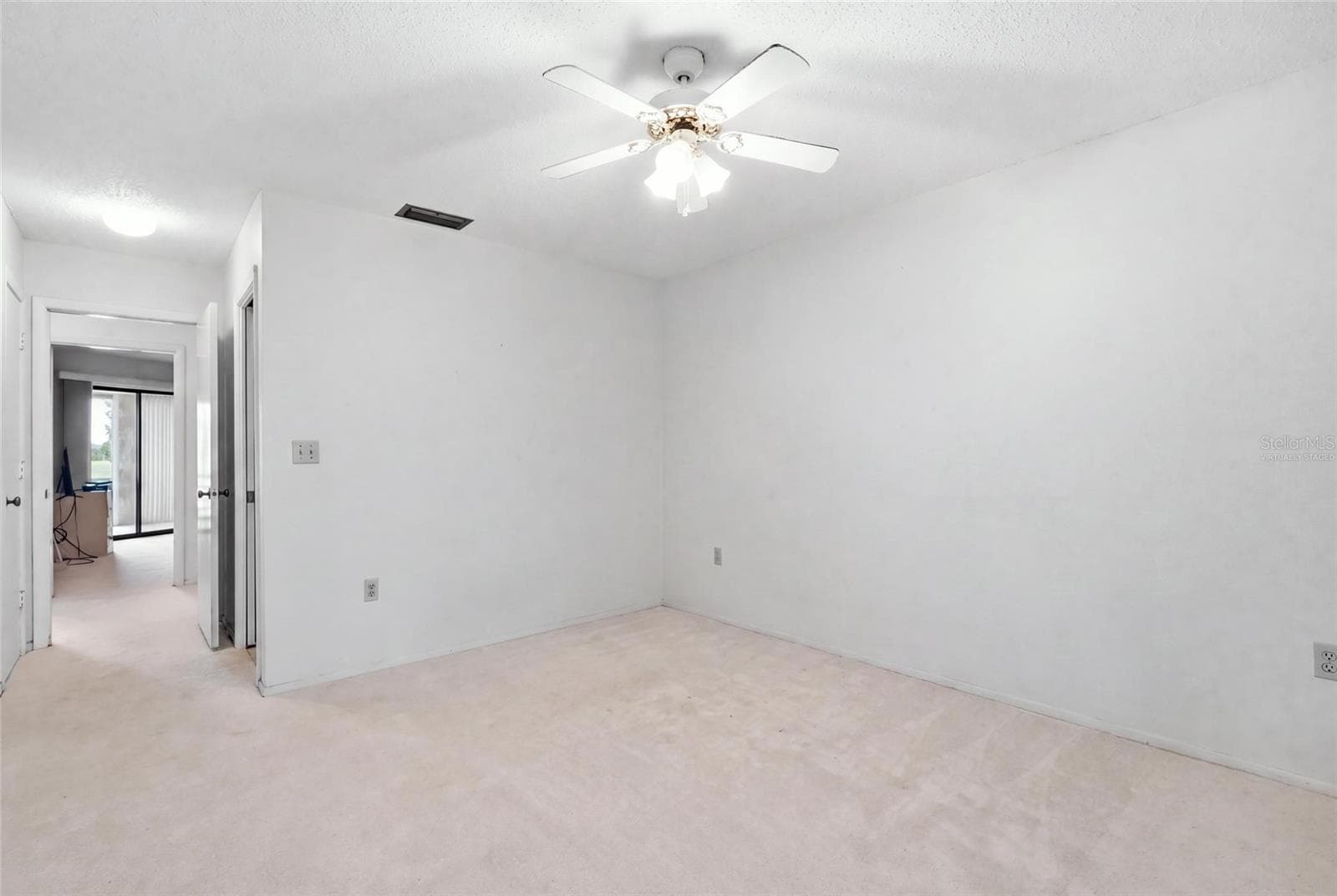 Virtually staged primary bedroom - 3500 EL CONQUISTADOR PKWY #332, BRADENTON