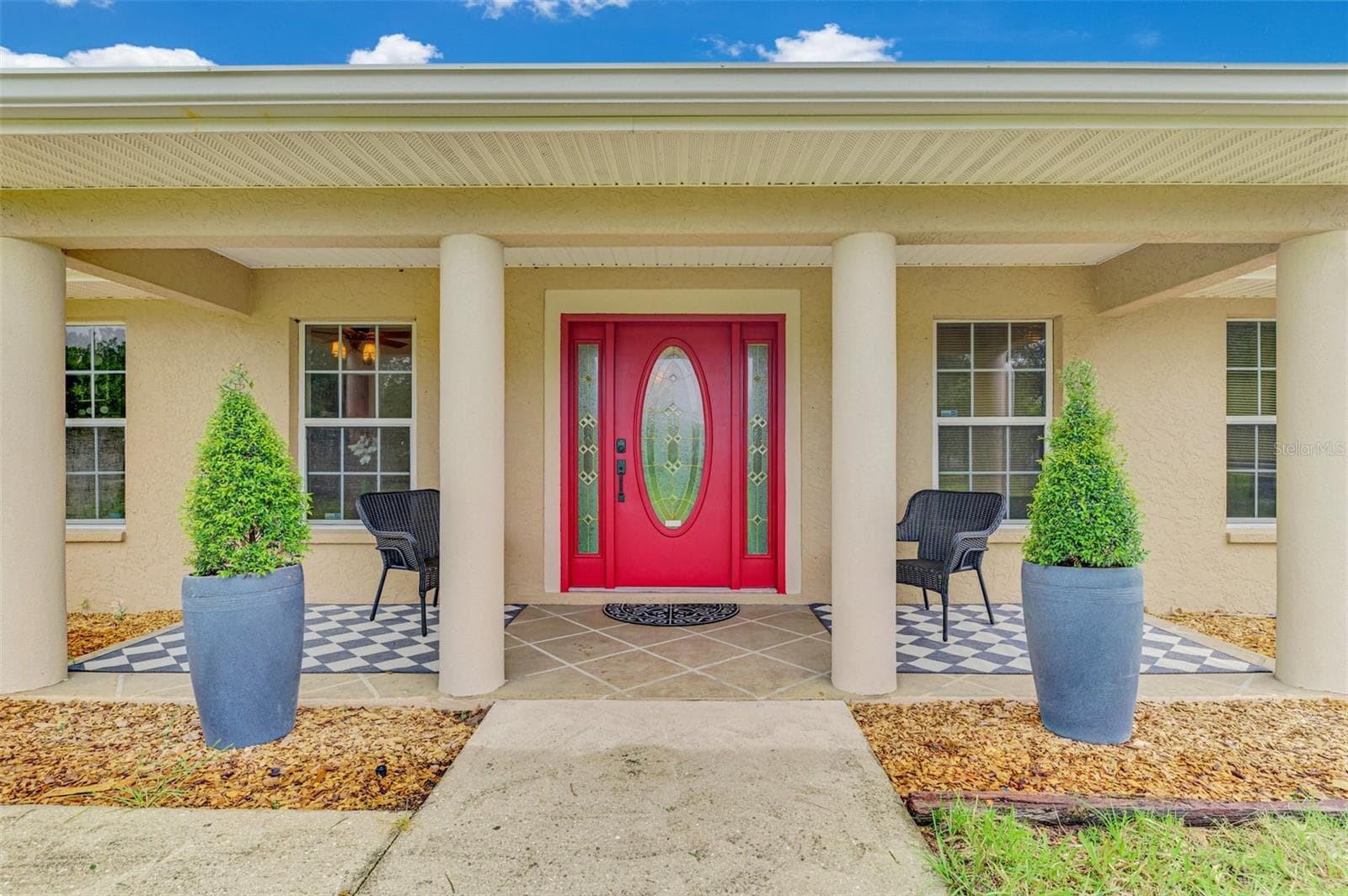Farmhouse style on your covered front porch - 4610 403RD ST E, MYAKKA CITY