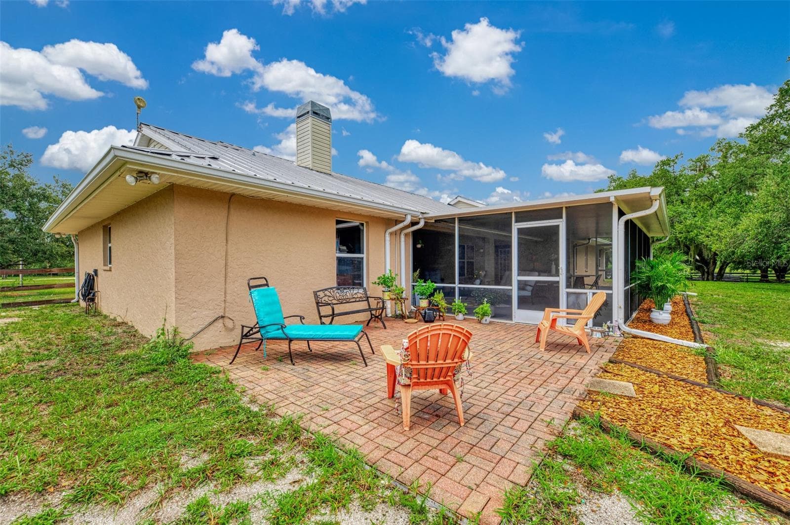 Patio off of the screened lanai - 4610 403RD ST E, MYAKKA CITY
