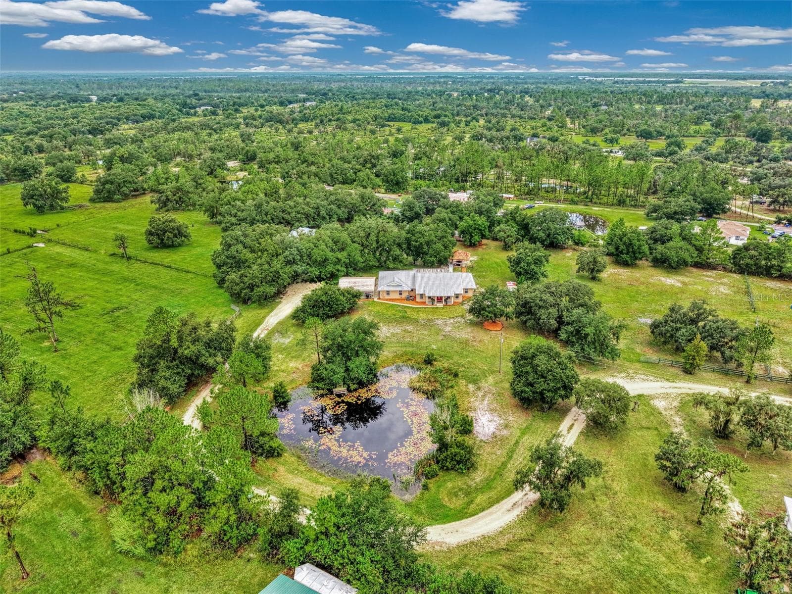 Aerial view looking to the West - 4610 403RD ST E, MYAKKA CITY