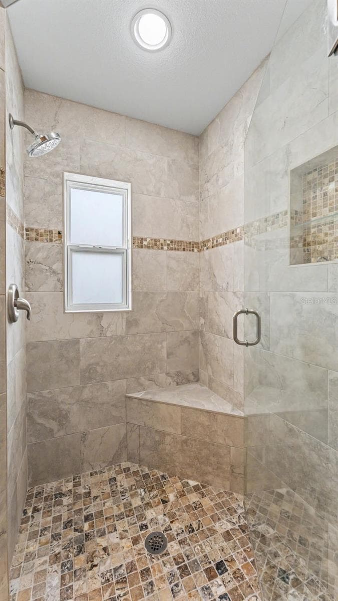 Upgraded remodeled shower in primary suite - 4765 HIGHLANDS PLACE CIR, LAKELAND