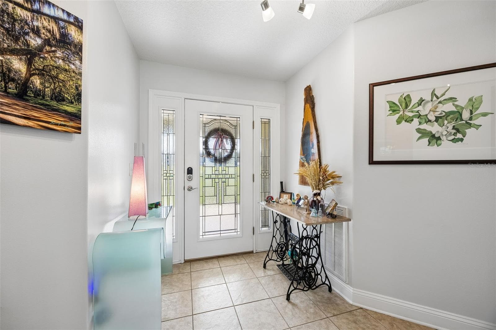 The Lovely Leaded Glass Entrance Door And Foyer - 107 EAGLES NEST LN, CRESCENT CITY