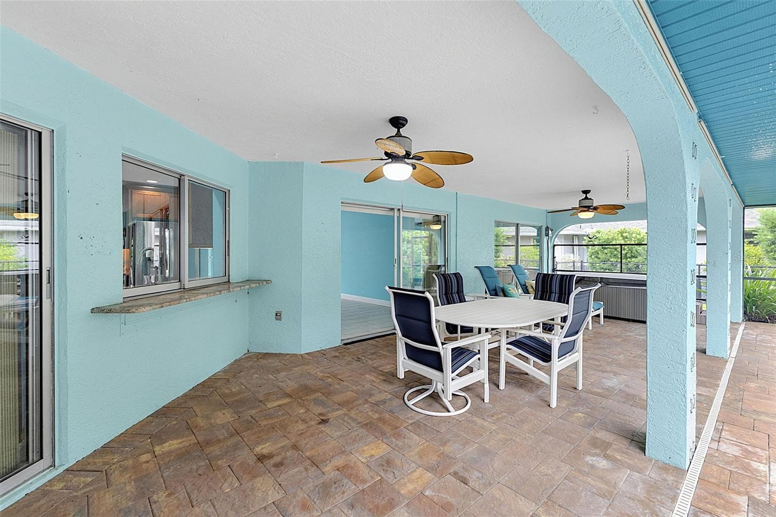 Covered lanai with kitchen passthrough window - 339 BARCELONA ST, PUNTA GORDA