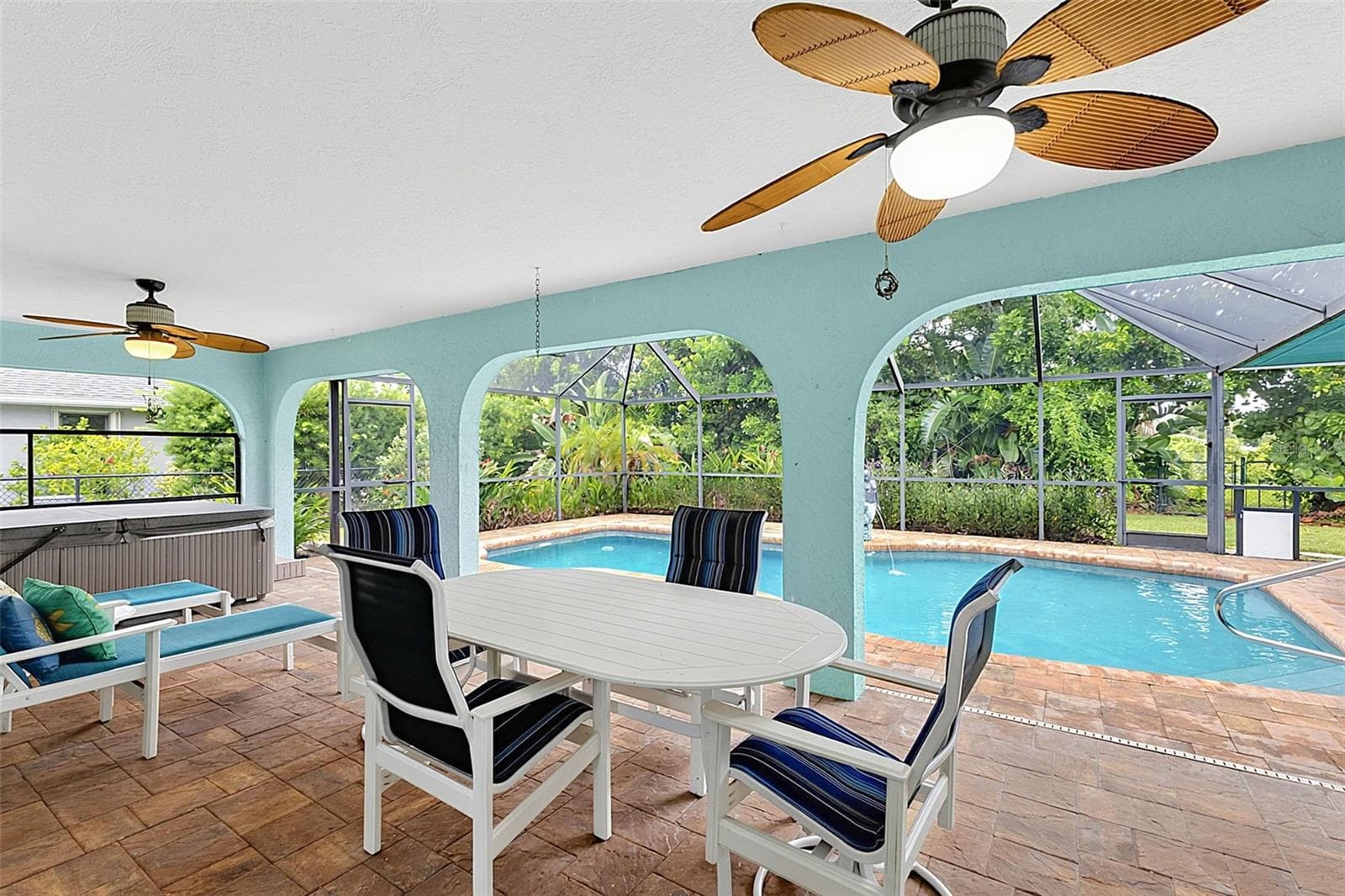 Covered lanai looking towards the pool - 339 BARCELONA ST, PUNTA GORDA