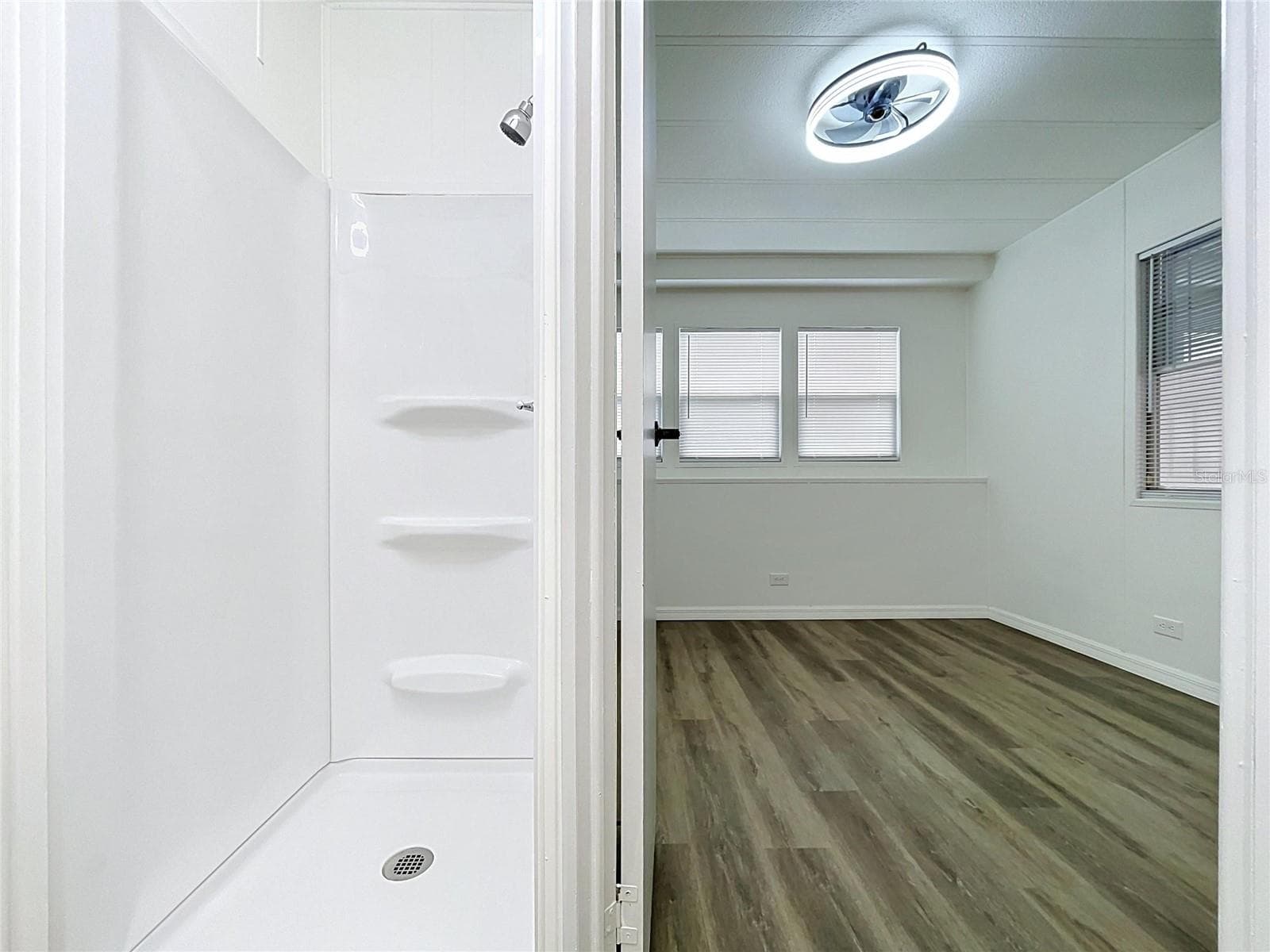 Bedroom 2 with on-suite bathroom - 6965 FORT KING RD, ZEPHYRHILLS