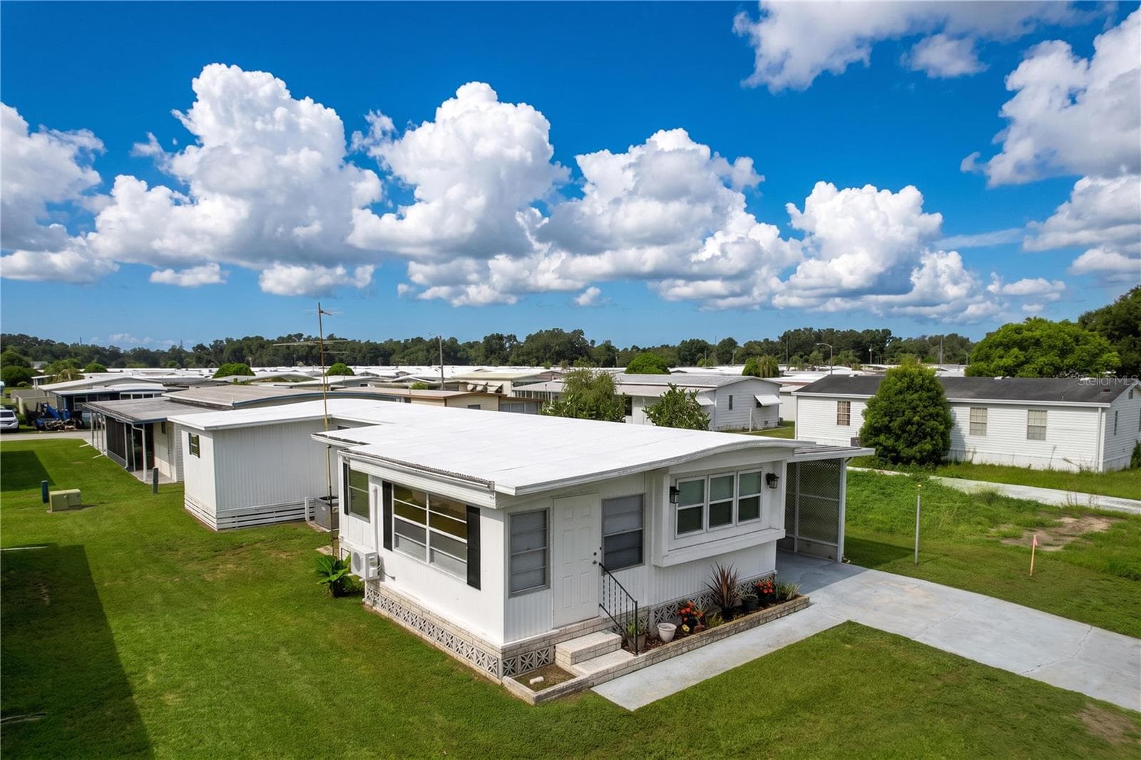 Front Side Elevation - 6965 FORT KING RD, ZEPHYRHILLS