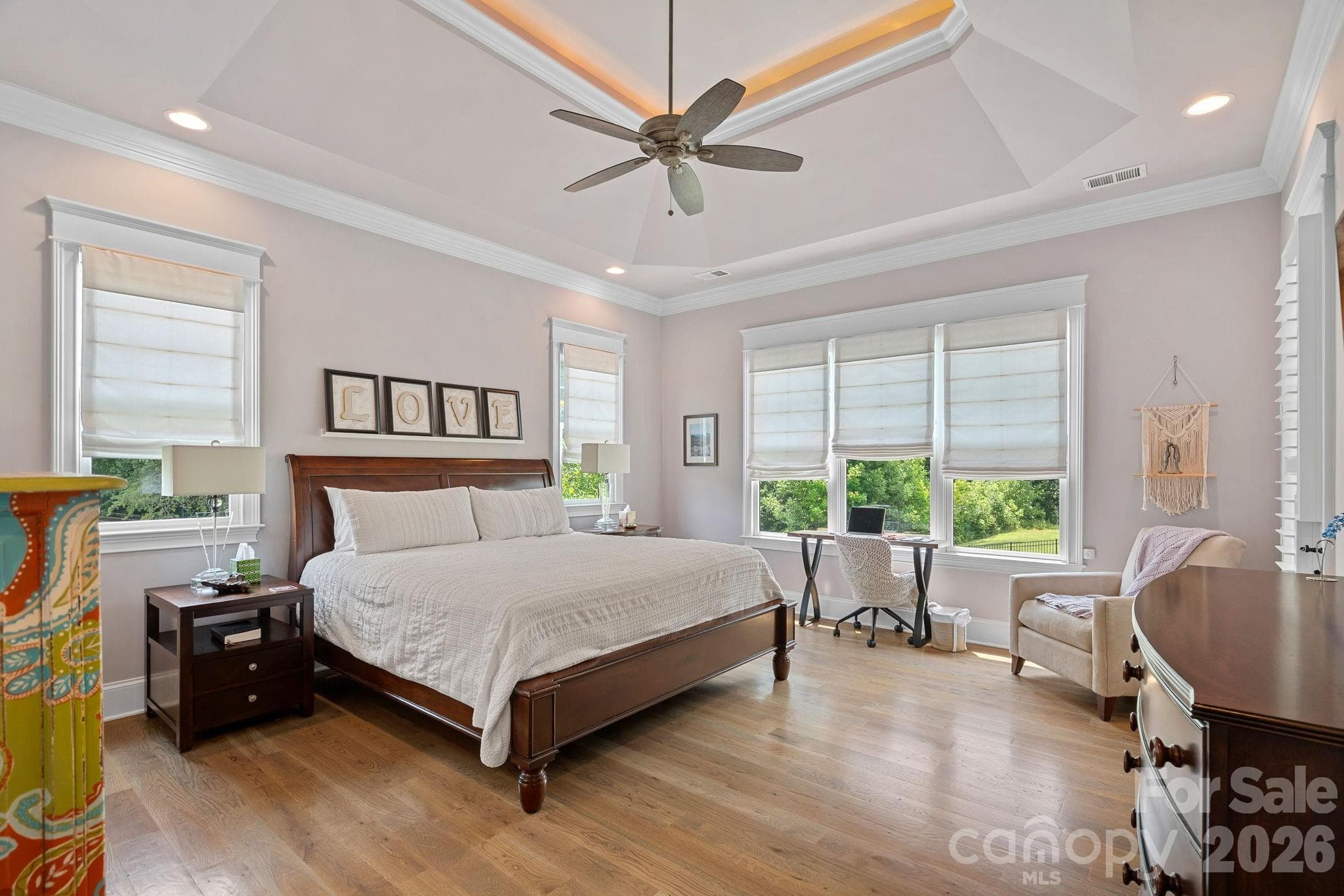 Primary bedroom/main floor - beautiful moldings and tray ceiling. - 2889 Mount Pleasant Road, Sherrills Ford